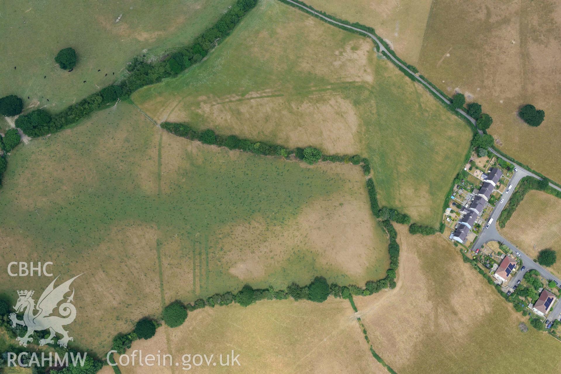 Aerial photograph: Pen-Llwyn Roman fort, with parchmarks. Crown: CHERISH PROJECT 2018. Produced with EU funds through the Ireland Wales Co-operation Programme 2014-2020 (NGR SN650806)