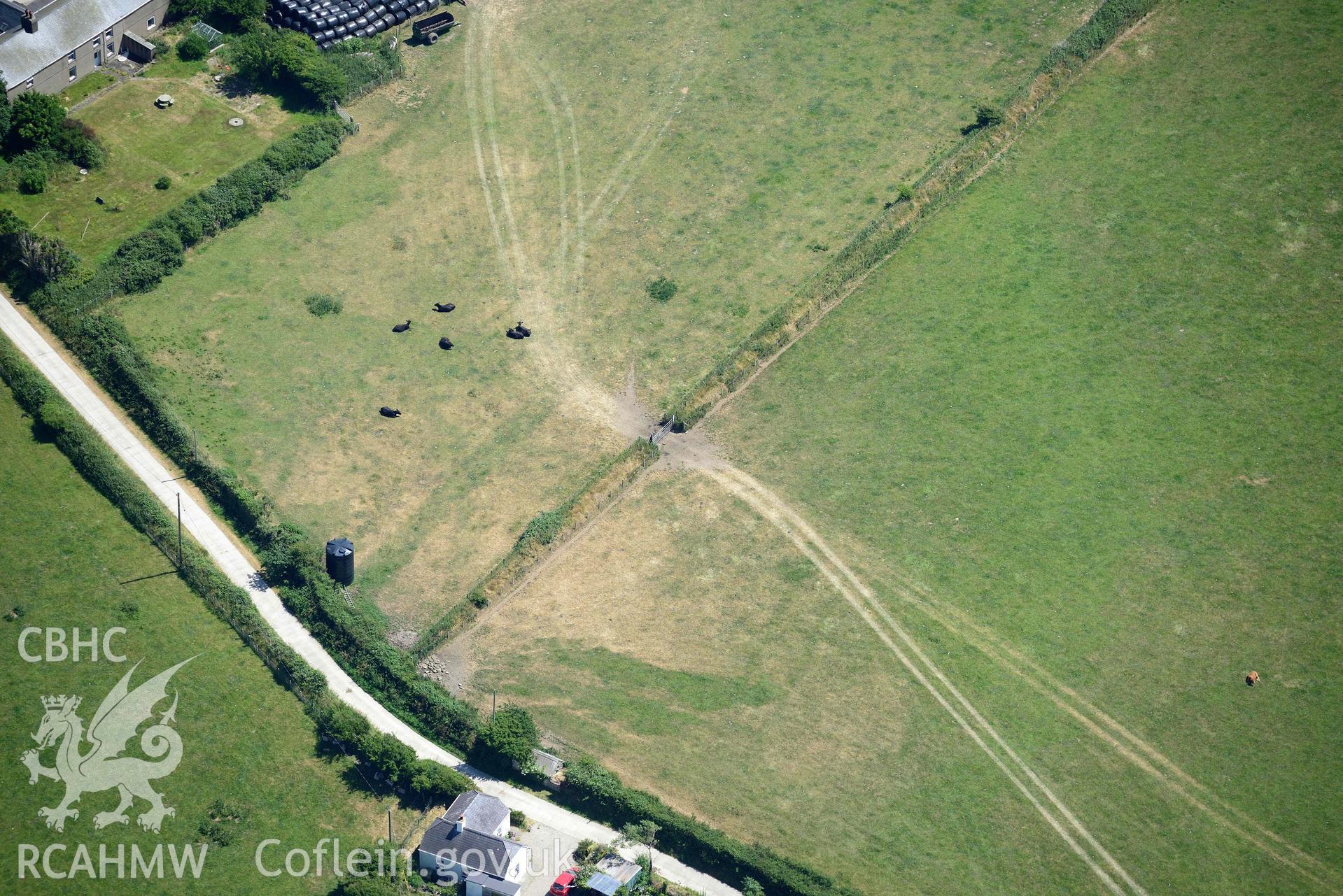 Aerial photograph: Cropmark enclosure at Hirdre Uchaf. Crown: CHERISH PROJECT 2018. Produced with EU funds through the Ireland Wales Co-operation Programme 2014-2020 (NGR SH255381)