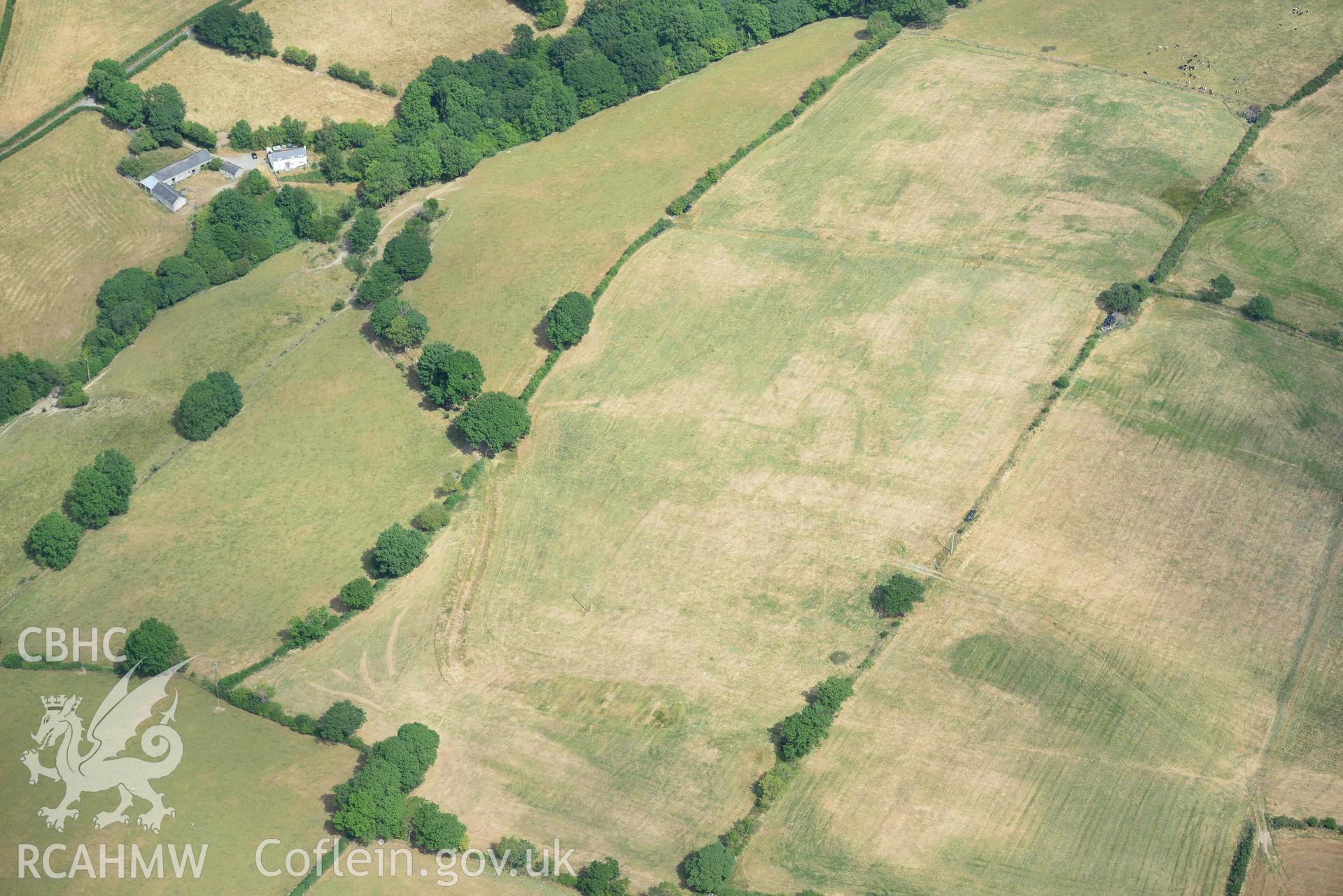 Aerial photograph: Gellifadog defended enclosure cropmark, view from west. Crown: CHERISH PROJECT 2018. Produced with EU funds through the Ireland Wales Co-operation Programme 2014-2020 (NGR SN654821)