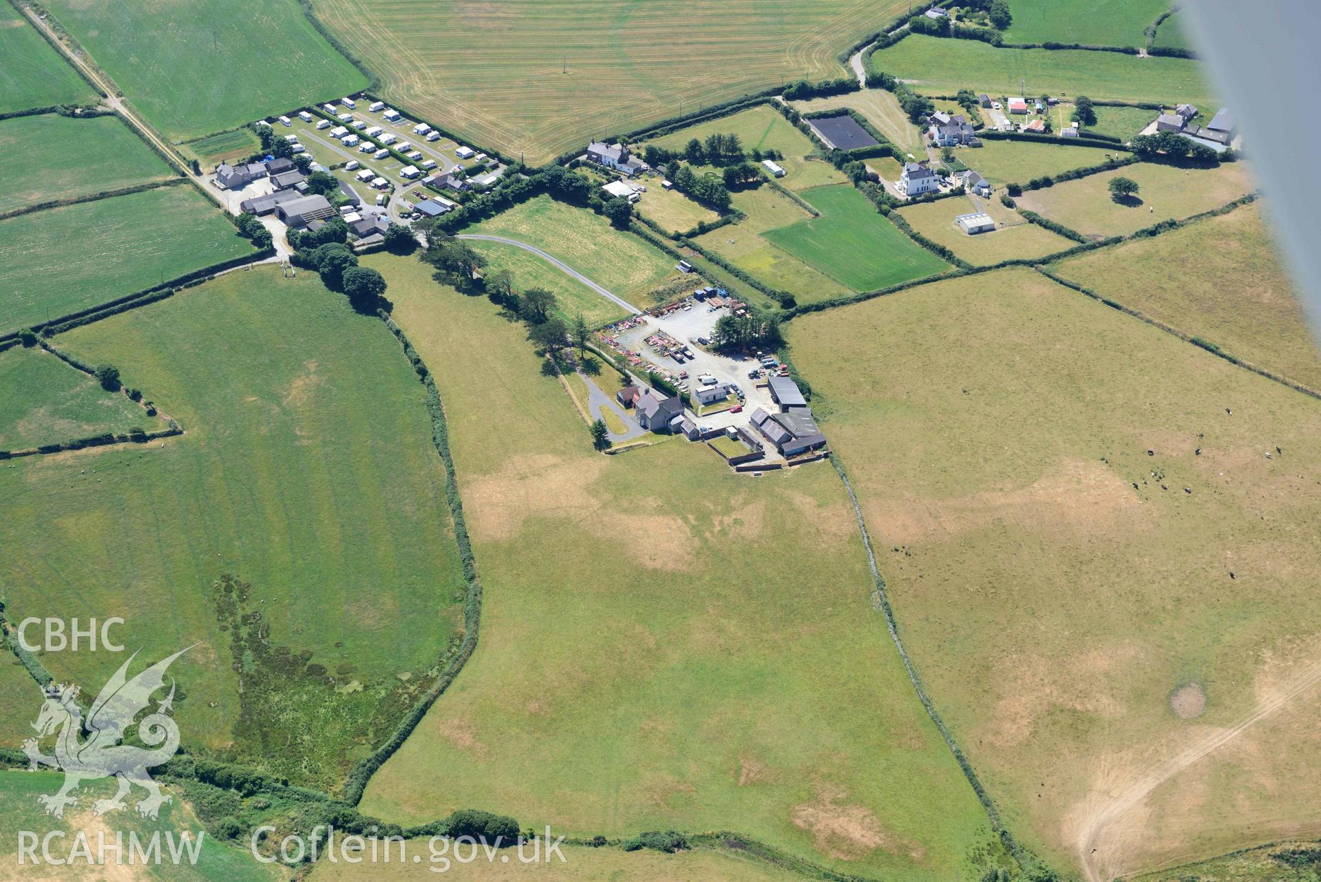 Aerial photograph: Bryniau or Bryn Rhydd cropmark enclosure. Crown: CHERISH PROJECT 2018. Produced with EU funds through the Ireland Wales Co-operation Programme 2014-2020 (NGR SH265387)