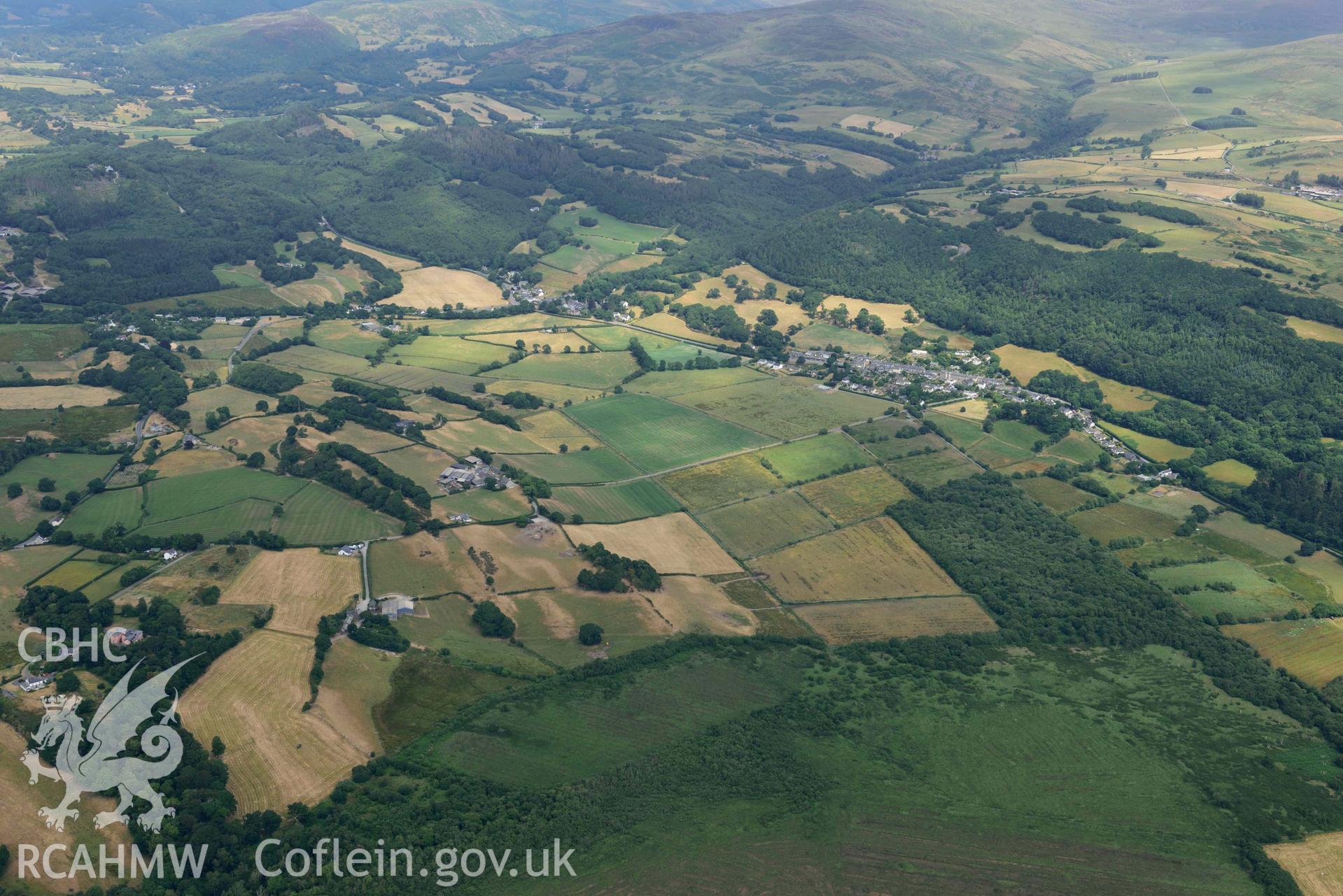 Aerial photograph: Tre Talisen village, view from west. Crown: CHERISH PROJECT 2018. Produced with EU funds through the Ireland Wales Co-operation Programme 2014-2020 (NGR SN657914)
