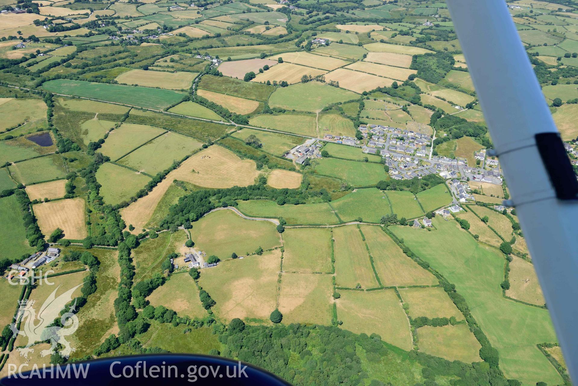 Aerial photograph: Drwsdeugoed cropmark enclosure. Crown: CHERISH PROJECT 2018. Produced with EU funds through the Ireland Wales Co-operation Programme 2014-2020 (NGR SH427380)