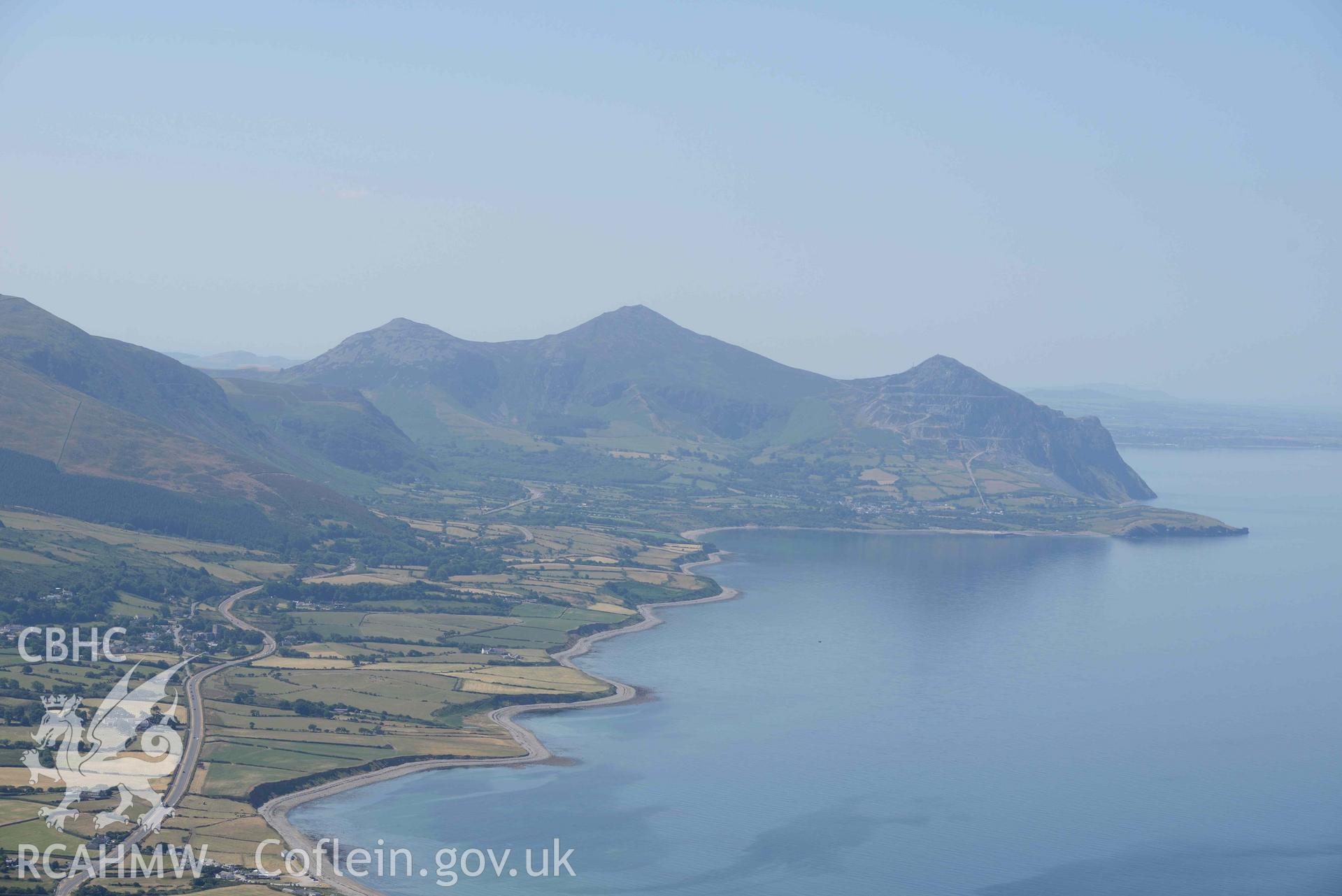 Aerial photograph: Yr Eifl hills and Trevor Quarry, view from north. Crown: CHERISH PROJECT 2018. Produced with EU funds through the Ireland Wales Co-operation Programme 2014-2020 (NGR SH363458)