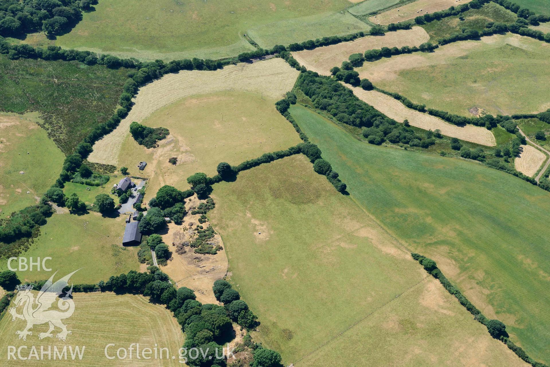 Aerial photograph: Carn Fadryn hillfort, landscape view from northeast. Crown: CHERISH PROJECT 2018. Produced with EU funds through the Ireland Wales Co-operation Programme 2014-2020 (NGR SH280352)