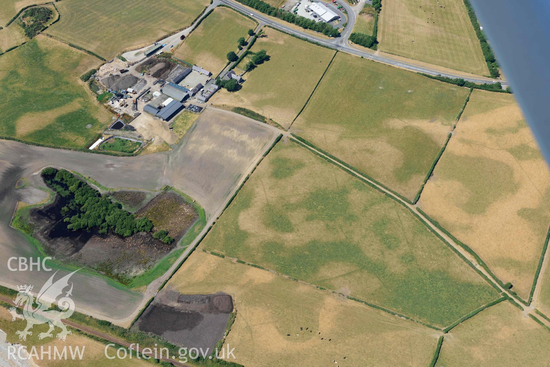 Aerial photograph: Glanllynnau early field system cropmarks, view from south-east. Crown: CHERISH PROJECT 2018. Produced with EU funds through the Ireland Wales Co-operation Programme 2014-2020 (NGR SH458376)