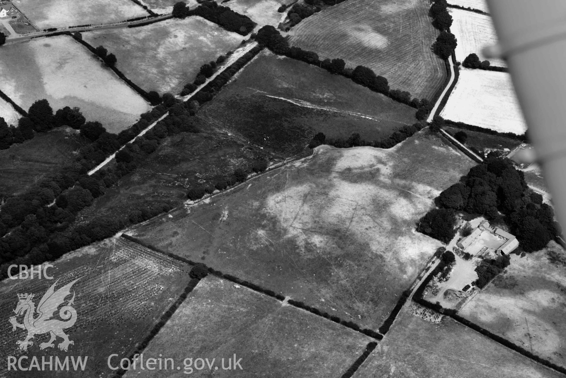 Aerial photograph: Maesbanadlog rectangular enclosure, cropmark. Crown: CHERISH PROJECT 2018. Produced with EU funds through the Ireland Wales Co-operation Programme 2014-2020 (NGR SN705671)