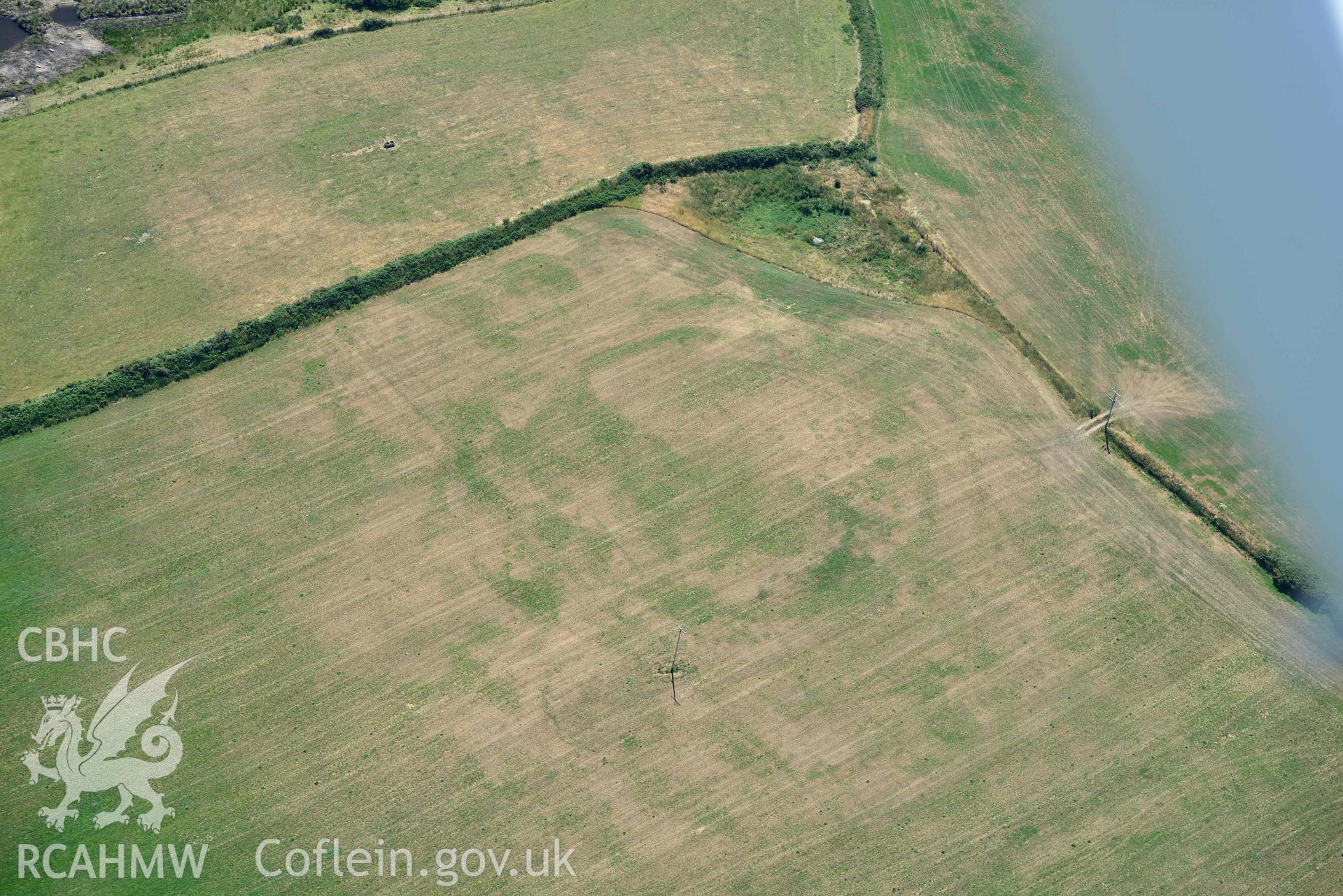 Aerial photograph: Bryniau or Bryn Rhydd cropmark enclosure. Crown: CHERISH PROJECT 2018. Produced with EU funds through the Ireland Wales Co-operation Programme 2014-2020 (NGR SH265387)