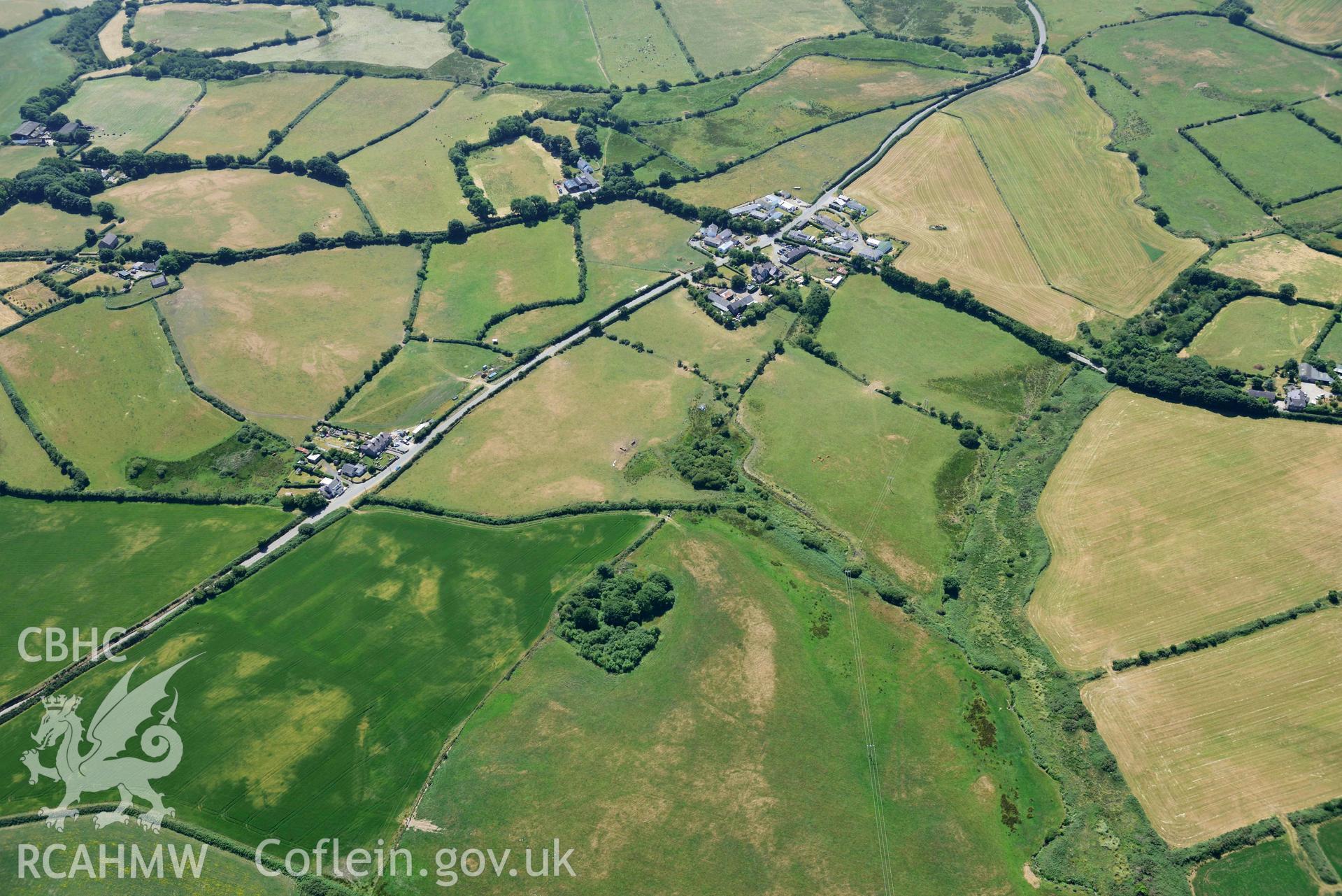 Aerial photograph: Pwll Parc cropmark enclosure, view from east. Crown: CHERISH PROJECT 2018. Produced with EU funds through the Ireland Wales Co-operation Programme 2014-2020 (NGR SH269400)