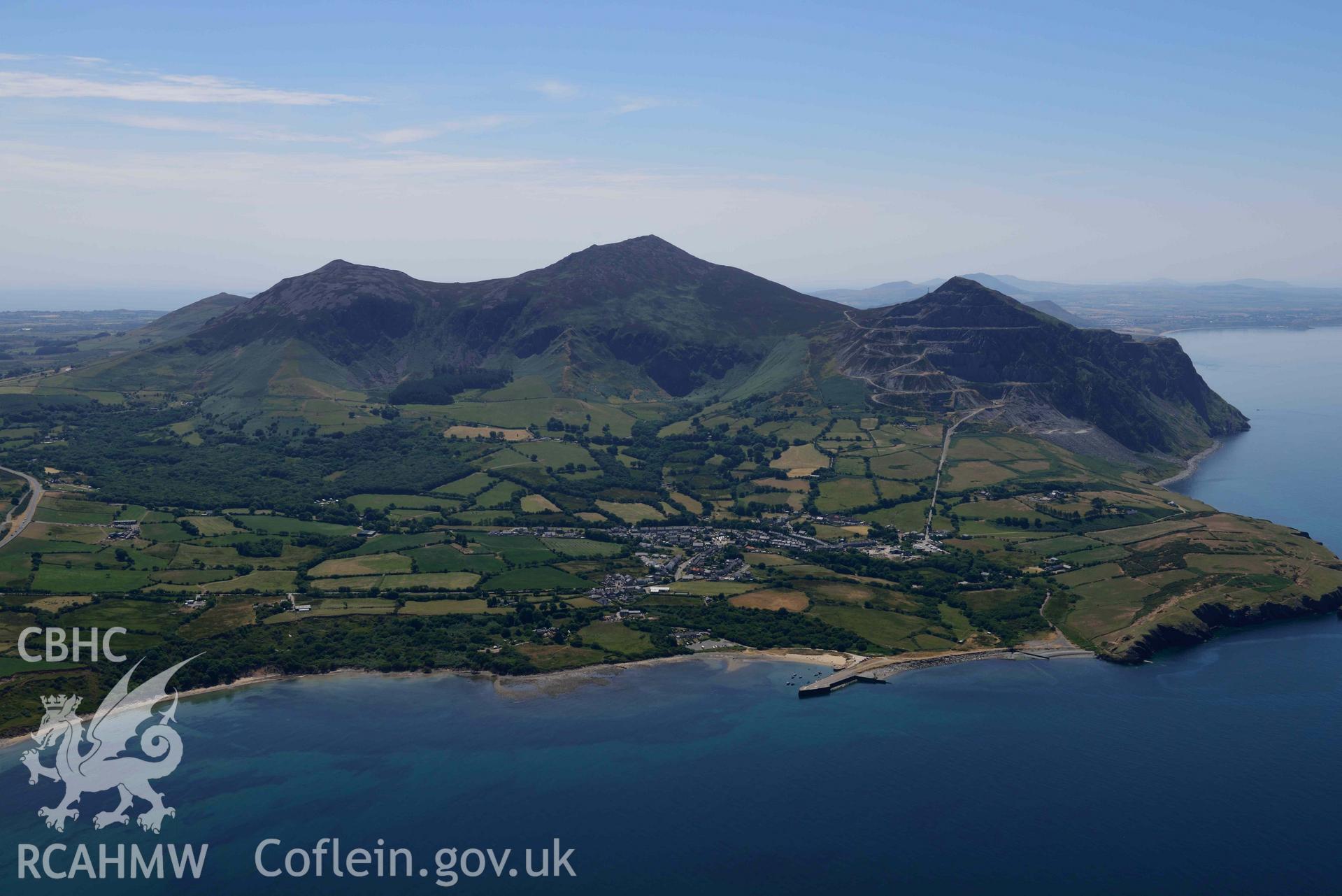 Aerial photograph: Tre'r Ceiri hillfort and Yr Eifl hills, view from north. Crown: CHERISH PROJECT 2018. Produced with EU funds through the Ireland Wales Co-operation Programme 2014-2020 (NGR SH373446)
