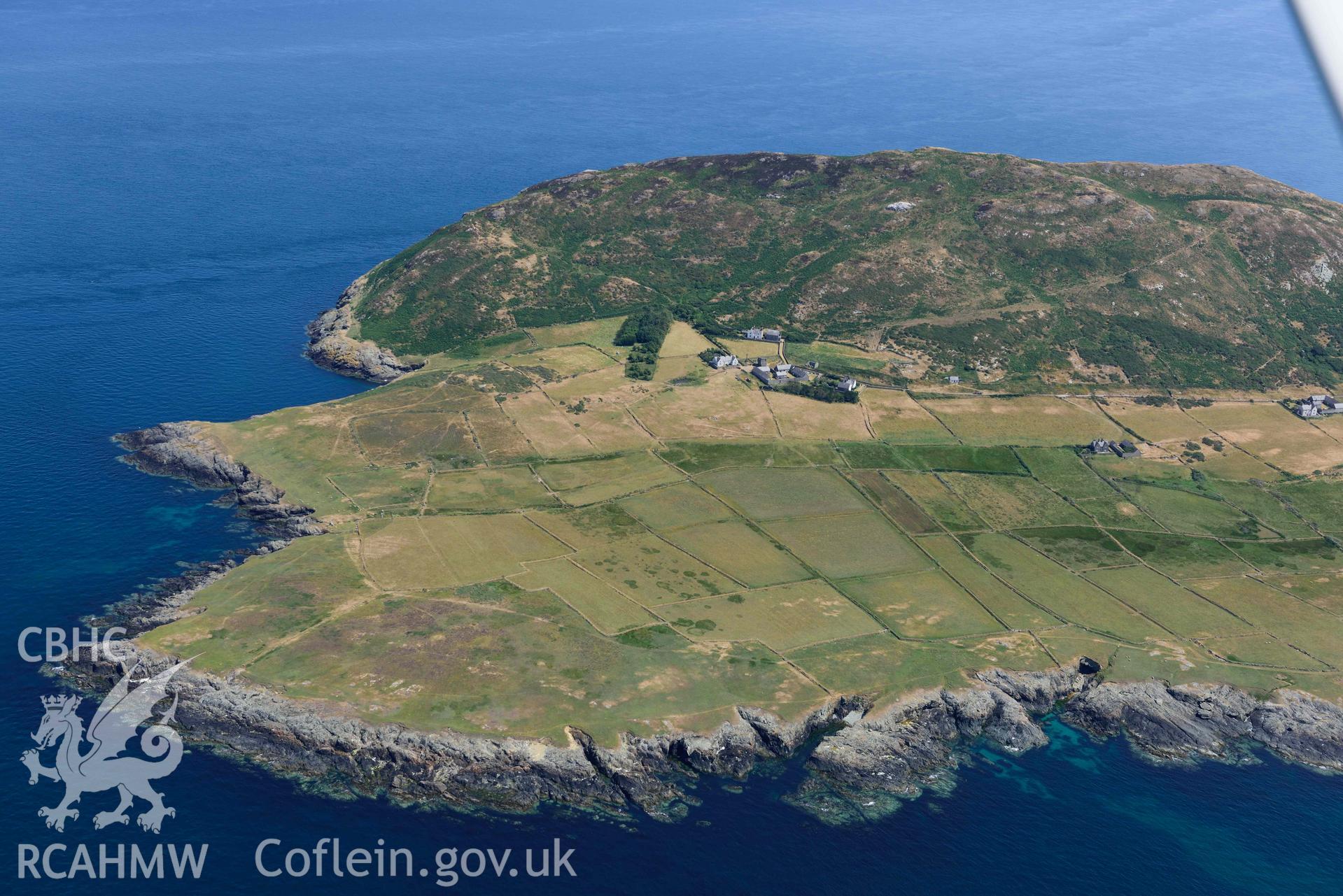 Aerial photograph: Ynys Enlli or Bardsey Island, view from the north-west with St Mary's Abbey. Crown: CHERISH PROJECT 2018. Produced with EU funds through the Ireland Wales Co-operation Programme 2014-2020 (NGR SH119221)