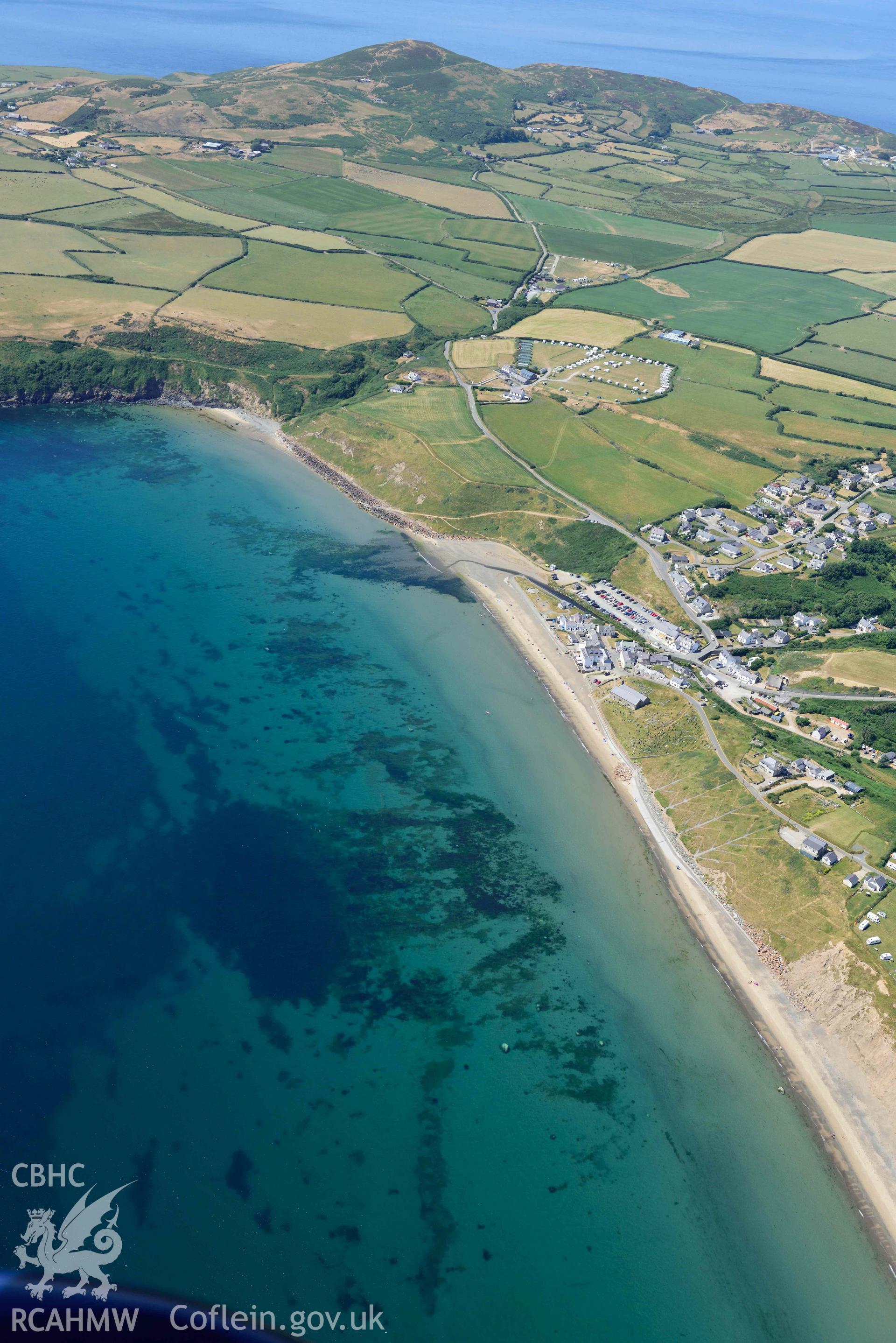 Aerial photograph: Mellionydd Enclosure, visible as a cropmark. Crown: CHERISH PROJECT 2018. Produced with EU funds through the Ireland Wales Co-operation Programme 2014-2020 (NGR SH218290)