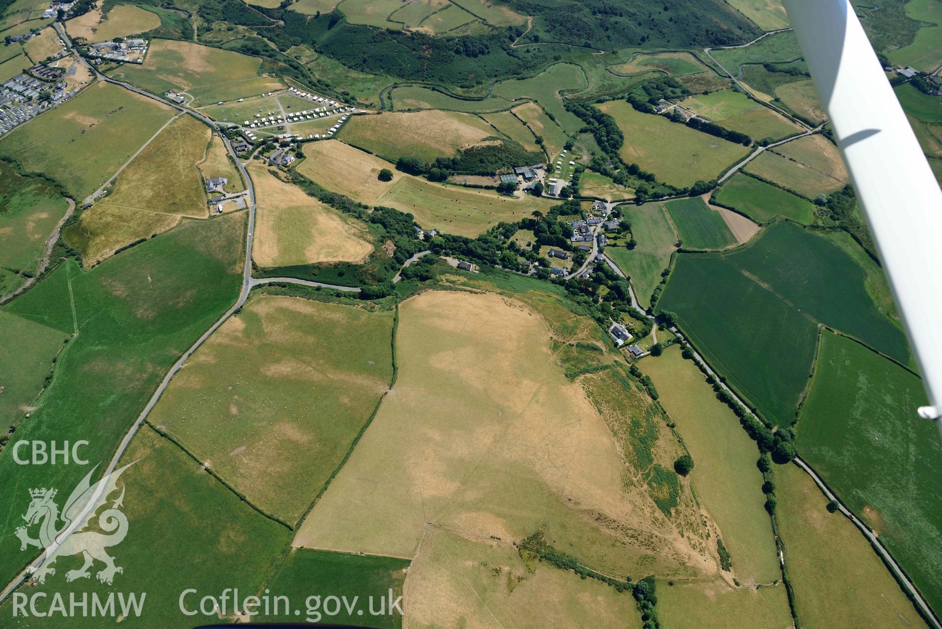 Aerial photograph: Llangian: cropmarks of early promontory enclosure, from north. Crown: CHERISH PROJECT 2018. Produced with EU funds through the Ireland Wales Co-operation Programme 2014-2020 (NGR SH294292)