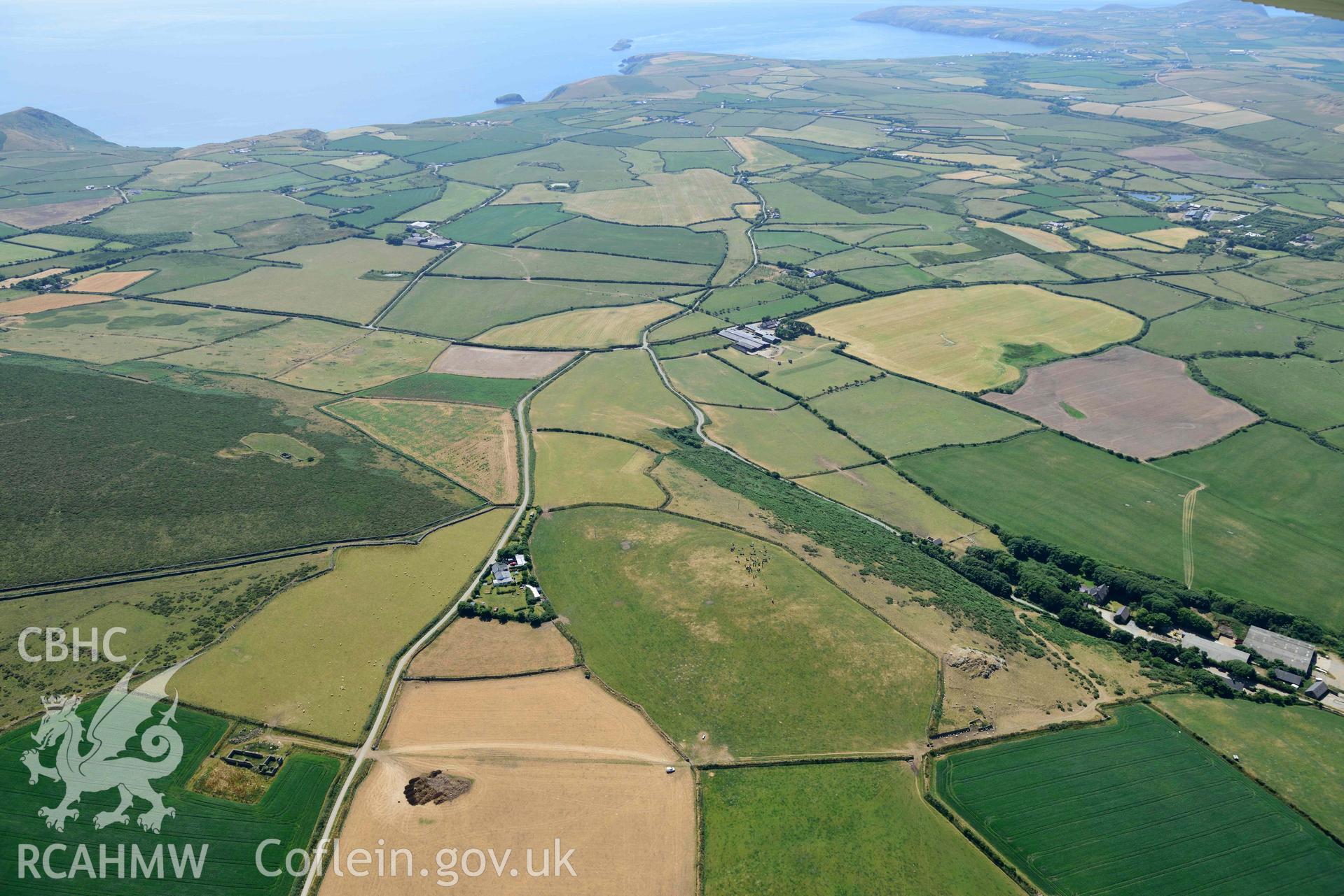 Aerial photograph: Bod-Nithoedd cropmark barrows; view of wider cropmarks south of Bodnithoedd farm. Crown: CHERISH PROJECT 2018. Produced with EU funds through the Ireland Wales Co-operation Programme 2014-2020 (NGR SH254311)
