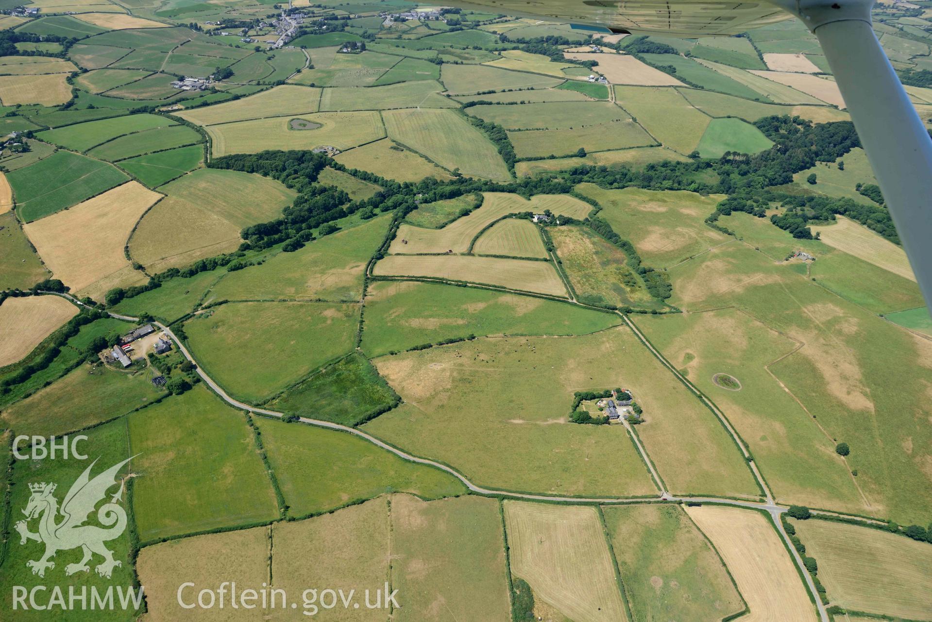 Aerial photograph: Bryn Llewelyn farm, parchmarks of former field systems. Crown: CHERISH PROJECT 2018. Produced with EU funds through the Ireland Wales Co-operation Programme 2014-2020 (NGR SH278302)