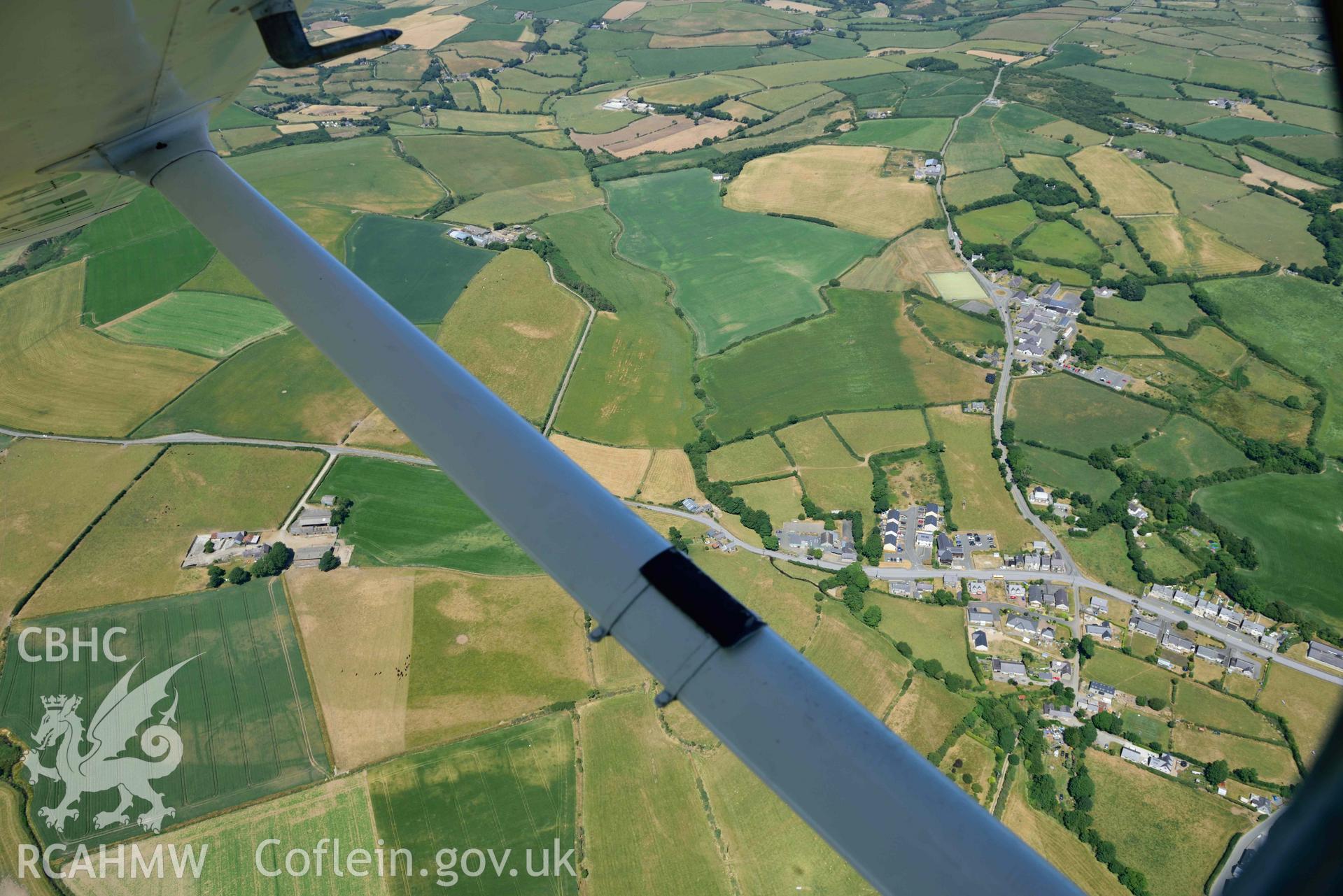 Aerial photograph: Bod-Nithoedd cropmark barrows. Crown: CHERISH PROJECT 2018. Produced with EU funds through the Ireland Wales Co-operation Programme 2014-2020 (NGR SH255312)