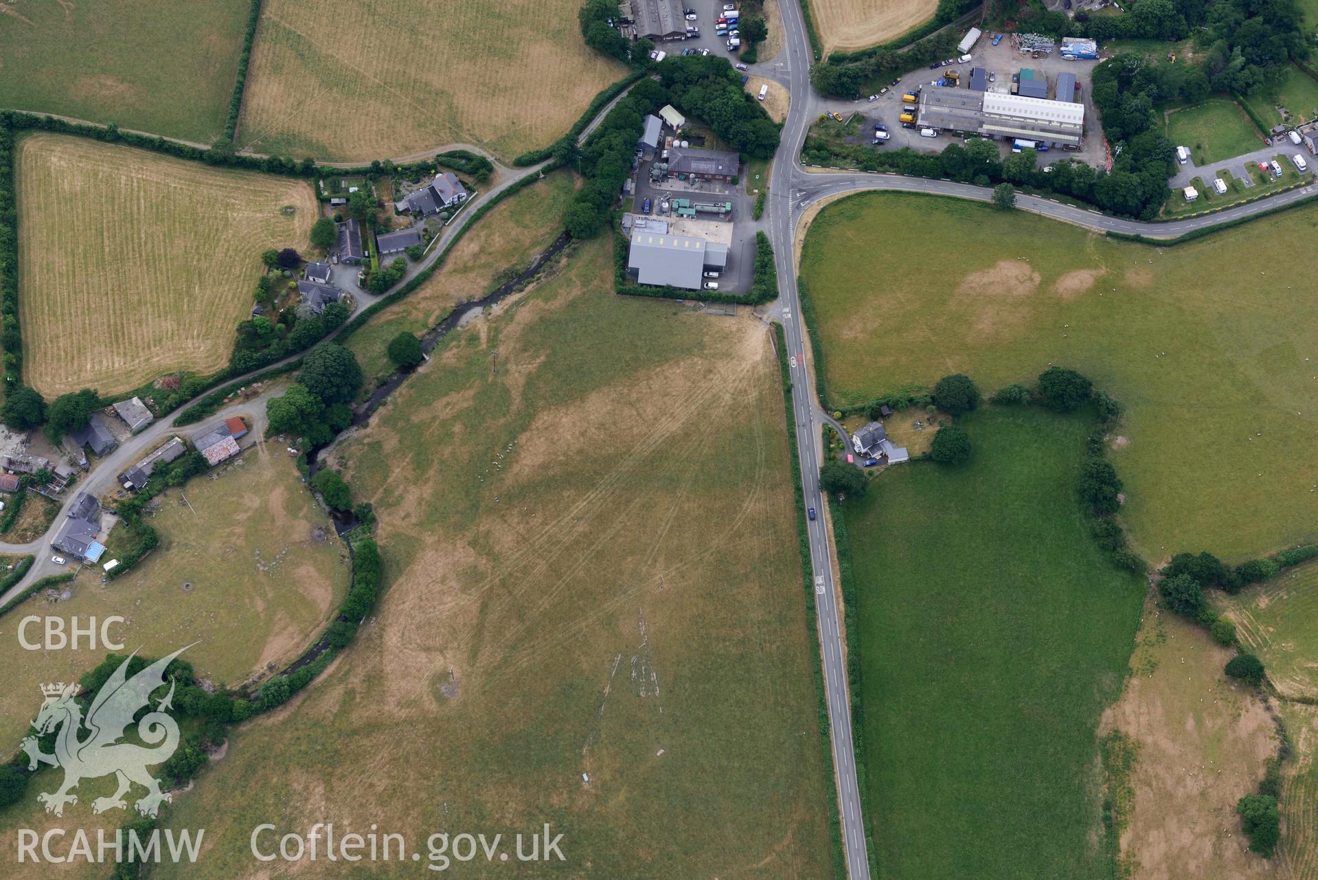 Aerial photograph: Bryncrug, Pont y Felindre, square barrow cemetery. Crown: CHERISH PROJECT 2018. Produced with EU funds through the Ireland Wales Co-operation Programme 2014-2020 (NGR SH613032)