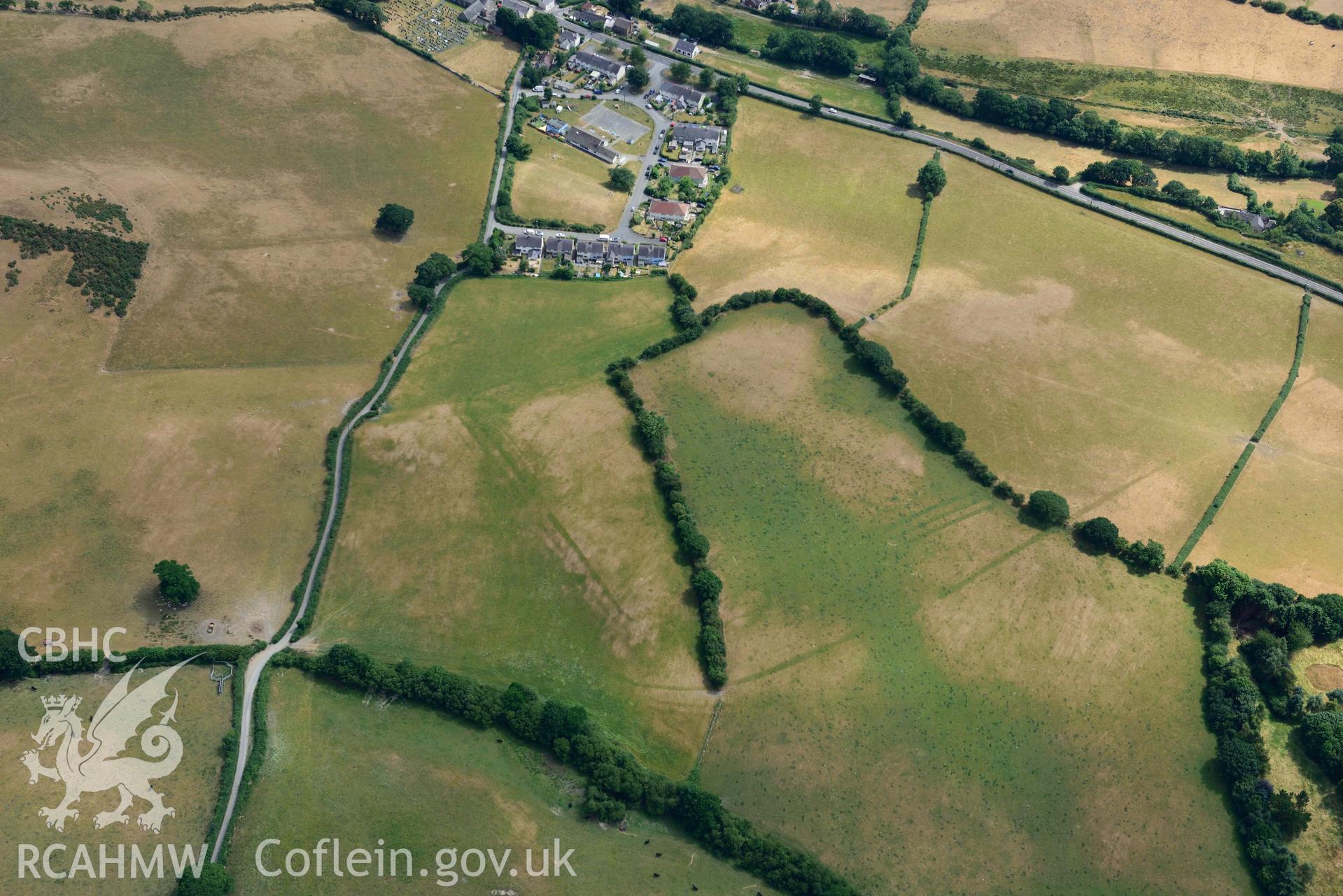 Aerial photograph: Pen-Llwyn Roman fort, with parchmarks. Crown: CHERISH PROJECT 2018. Produced with EU funds through the Ireland Wales Co-operation Programme 2014-2020 (NGR SN650806)