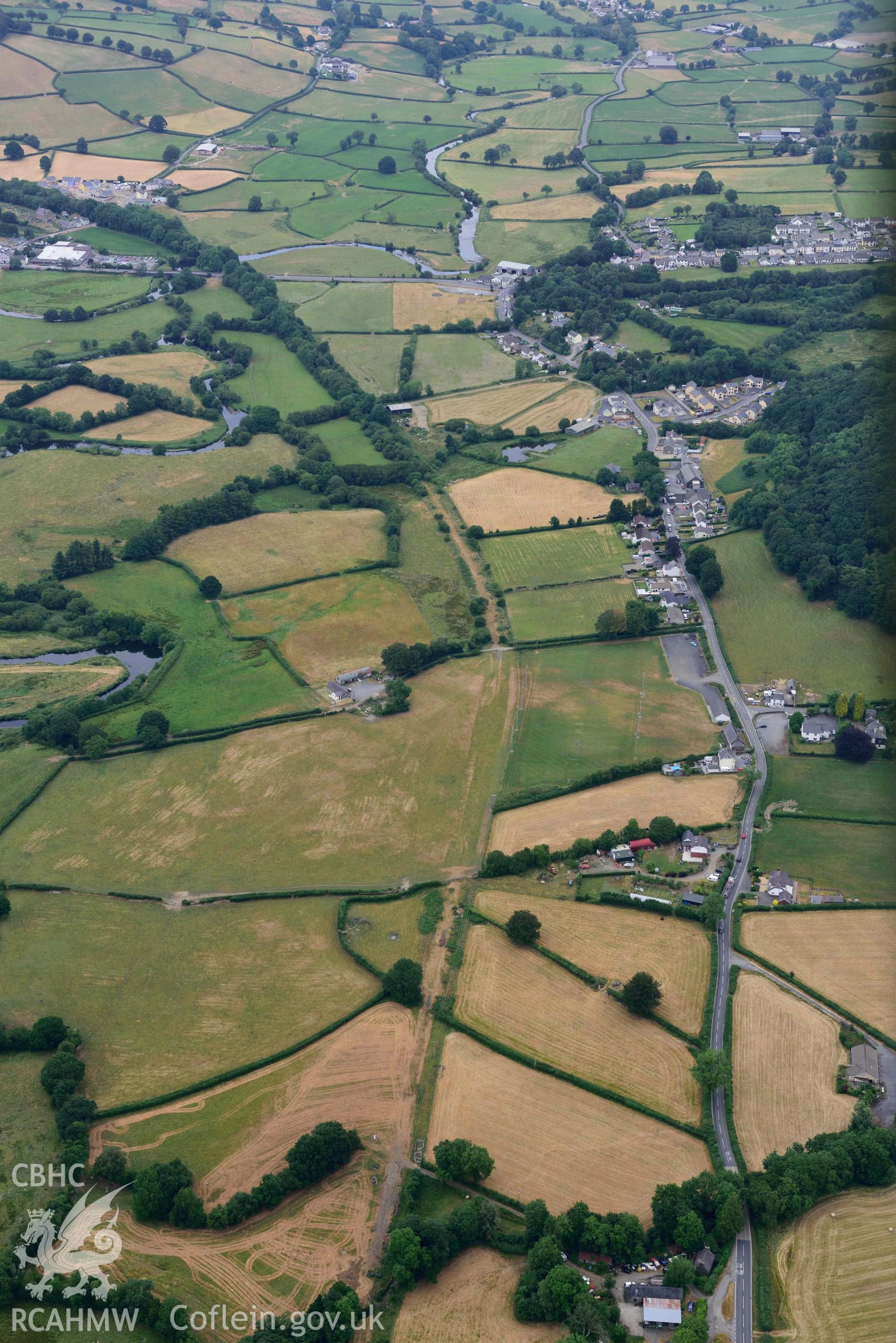 Aerial photograph: Cwmann, Lampeter Rugby Club ring ditch, landscape view from the south-west. Crown: CHERISH PROJECT 2018. Produced with EU funds through the Ireland Wales Co-operation Programme 2014-2020 (NGR SN577466)