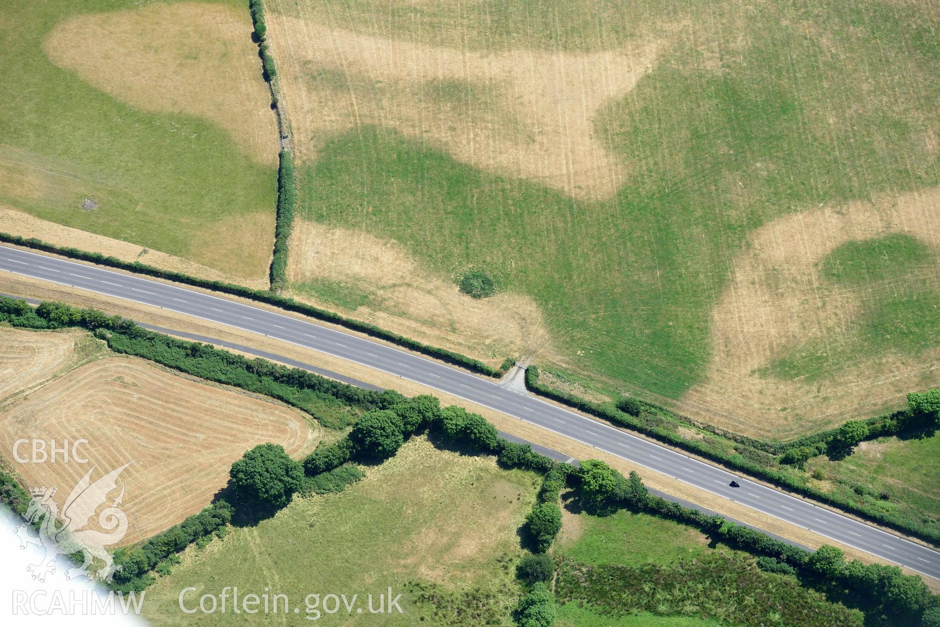 Aerial photograph: Hen-Efail cropmark enclosure. Crown: CHERISH PROJECT 2018. Produced with EU funds through the Ireland Wales Co-operation Programme 2014-2020 (NGR SH449377)