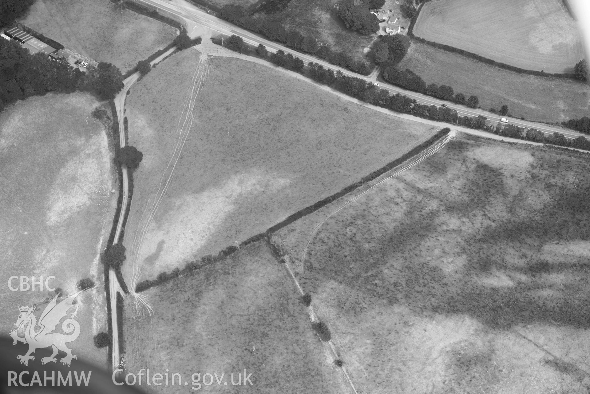 Aerial photograph: Odyn Fach; non-archaeological cropmarks in field to north west of enclosure. Crown: CHERISH PROJECT 2018. Produced with EU funds through the Ireland Wales Co-operation Programme 2014-2020 (NGR SN644877)