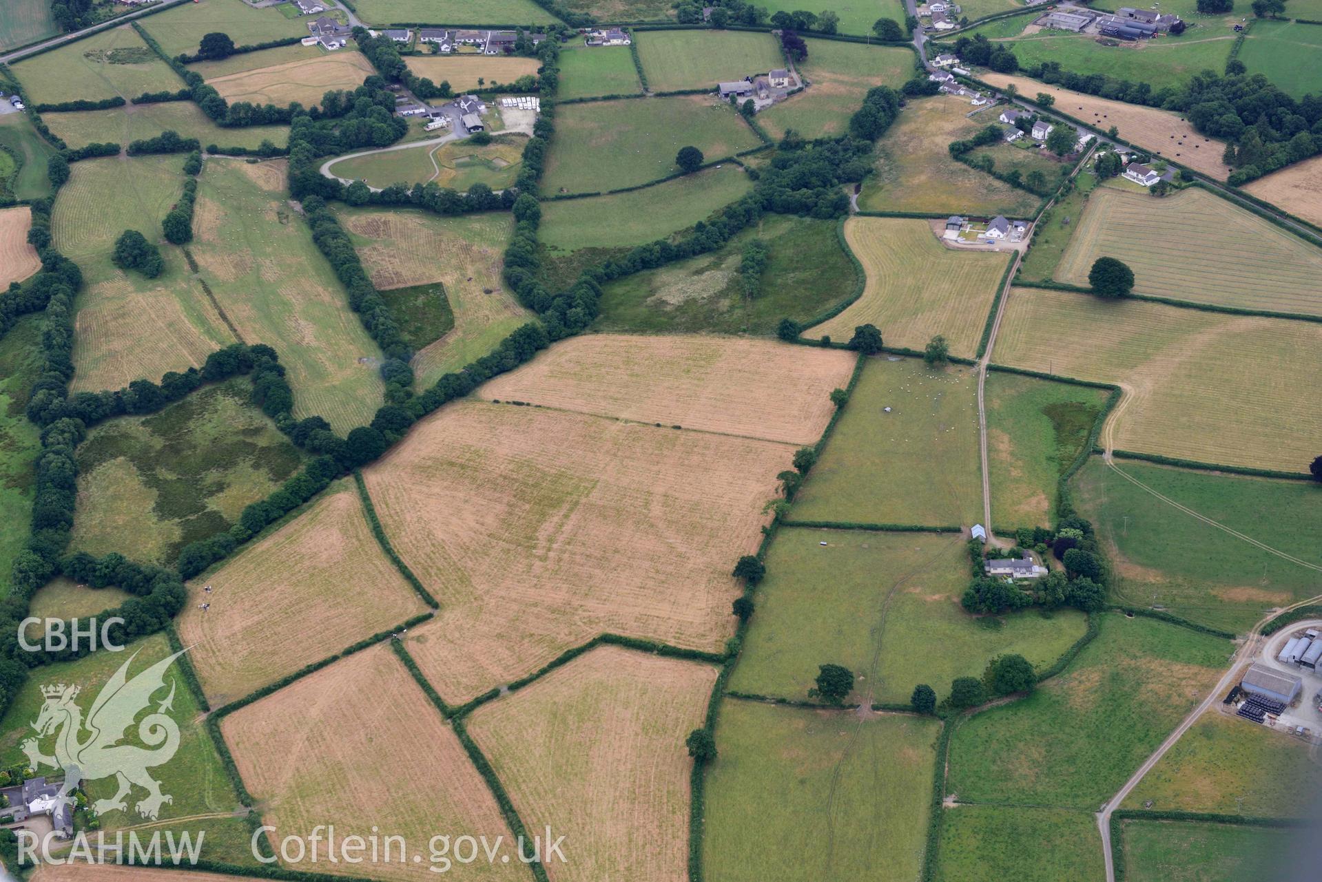 Aerial photograph: Glynrhiced-Fach or Glynricked, enclosure cropmarks. Crown: CHERISH PROJECT 2018. Produced with EU funds through the Ireland Wales Co-operation Programme 2014-2020 (NGR SN484401)
