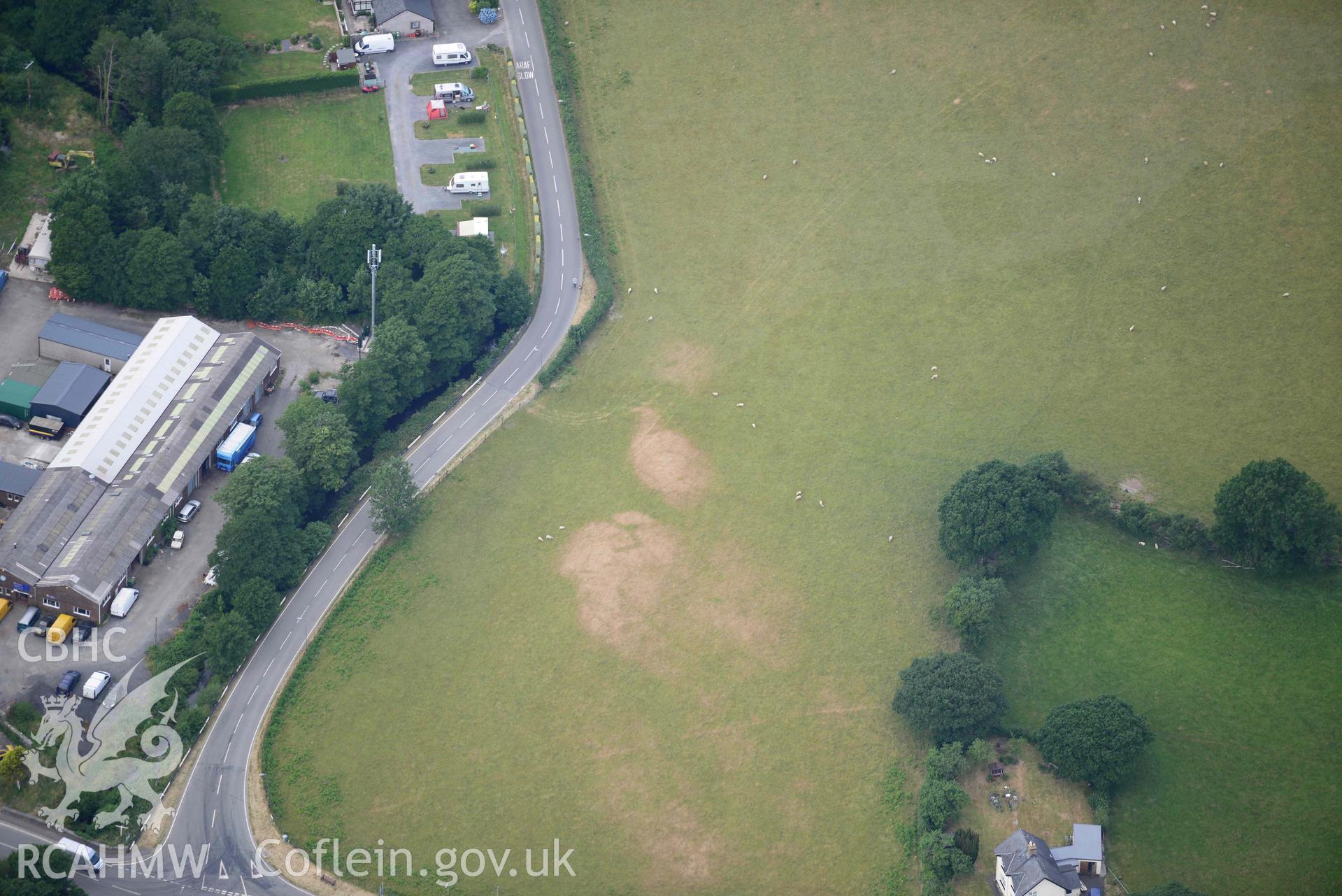 Aerial photograph: Bryncrug, Pont y Felindre, square barrow cemetery. Crown: CHERISH PROJECT 2018. Produced with EU funds through the Ireland Wales Co-operation Programme 2014-2020 (NGR SH613032)