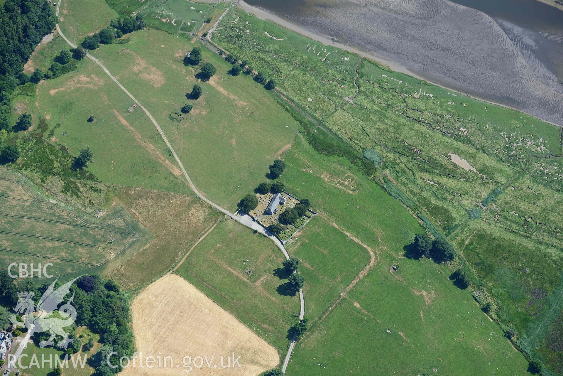 Aerial photograph: Caerhun Roman fort, with extensive parchmarks. View showing historic dock and waterfront. Crown: CHERISH PROJECT 2018. Produced with EU funds through the Ireland Wales Co-operation Programme 2014-2020 (NGR: SH779705)