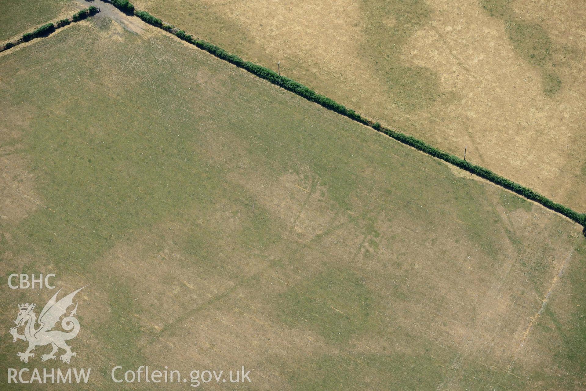 Aerial photograph: Glanllynnau early field system cropmarks; detail of possible building or settlement structure. Crown: CHERISH PROJECT 2018. Produced with EU funds through the Ireland Wales Co-operation Programme 2014-2020 (NGR SH461377)