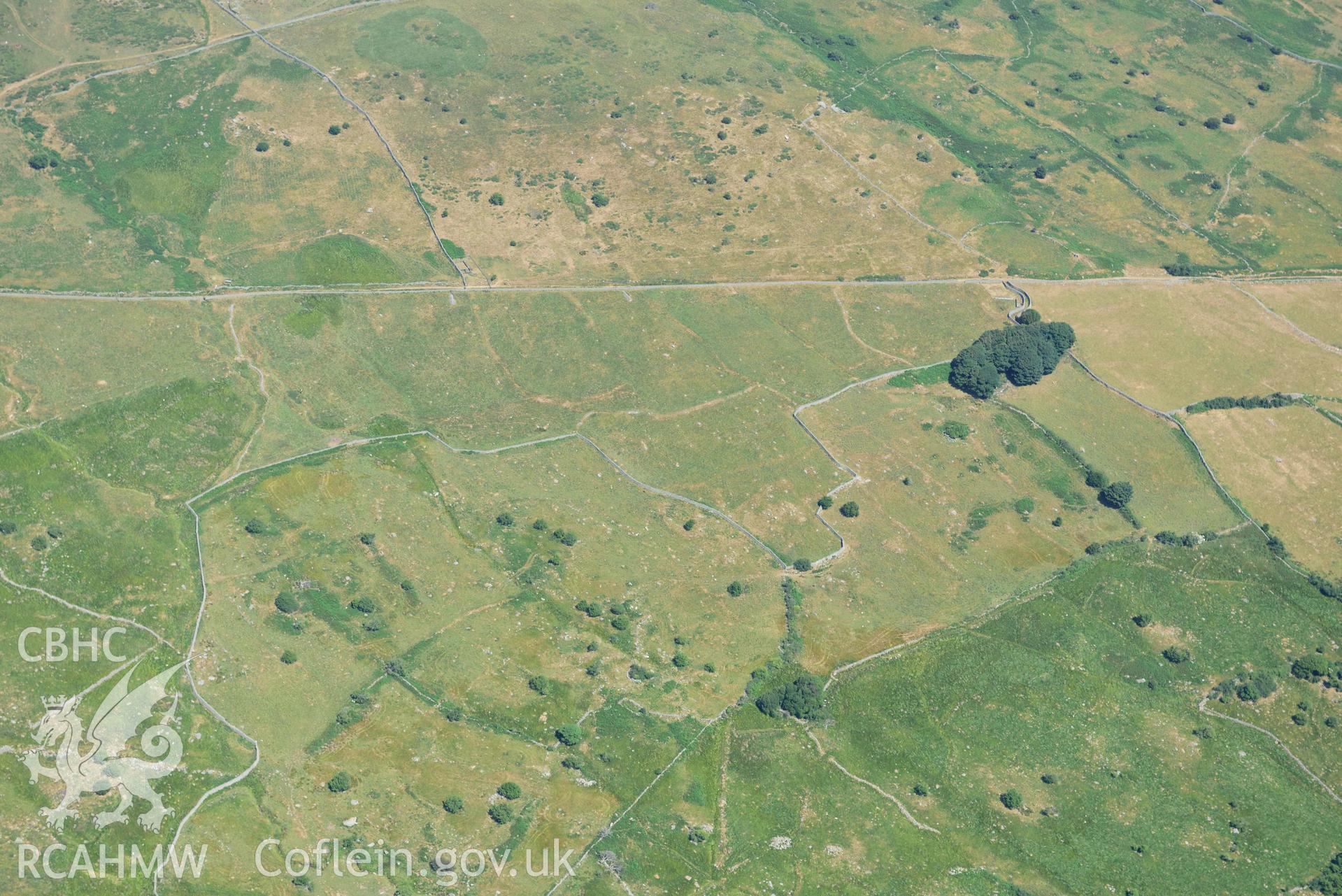 Aerial photograph: Homestead near Maen-y-bardd, Rowen. Crown: CHERISH PROJECT 2018. Produced with EU funds through the Ireland Wales Co-operation Programme 2014-2020 (NGR: SH739715)