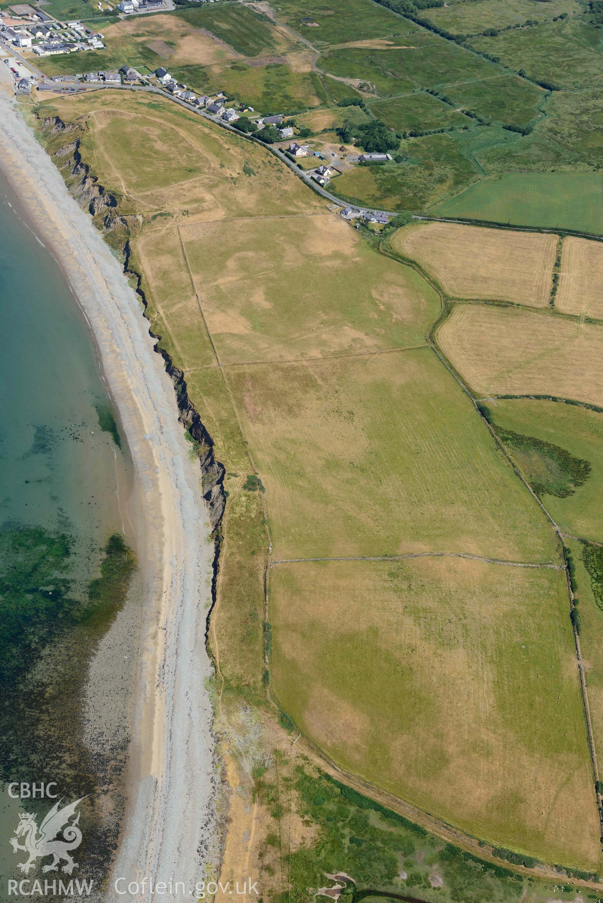 Aerial photograph: Field system south of Dinas Dinlle, view from south. Crown: CHERISH PROJECT 2018. Produced with EU funds through the Ireland Wales Co-operation Programme 2014-2020 (NGR: SH436557)