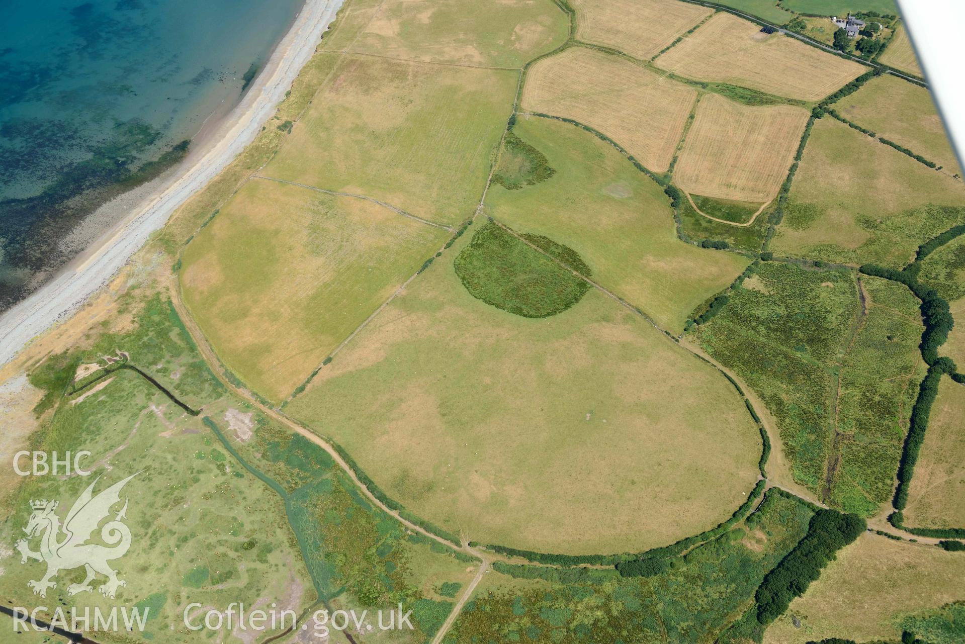 Aerial photograph: Field system south of Dinas Dinlle, view from southeast. Crown: CHERISH PROJECT 2018. Produced with EU funds through the Ireland Wales Co-operation Programme 2014-2020 (NGR: SH438556)