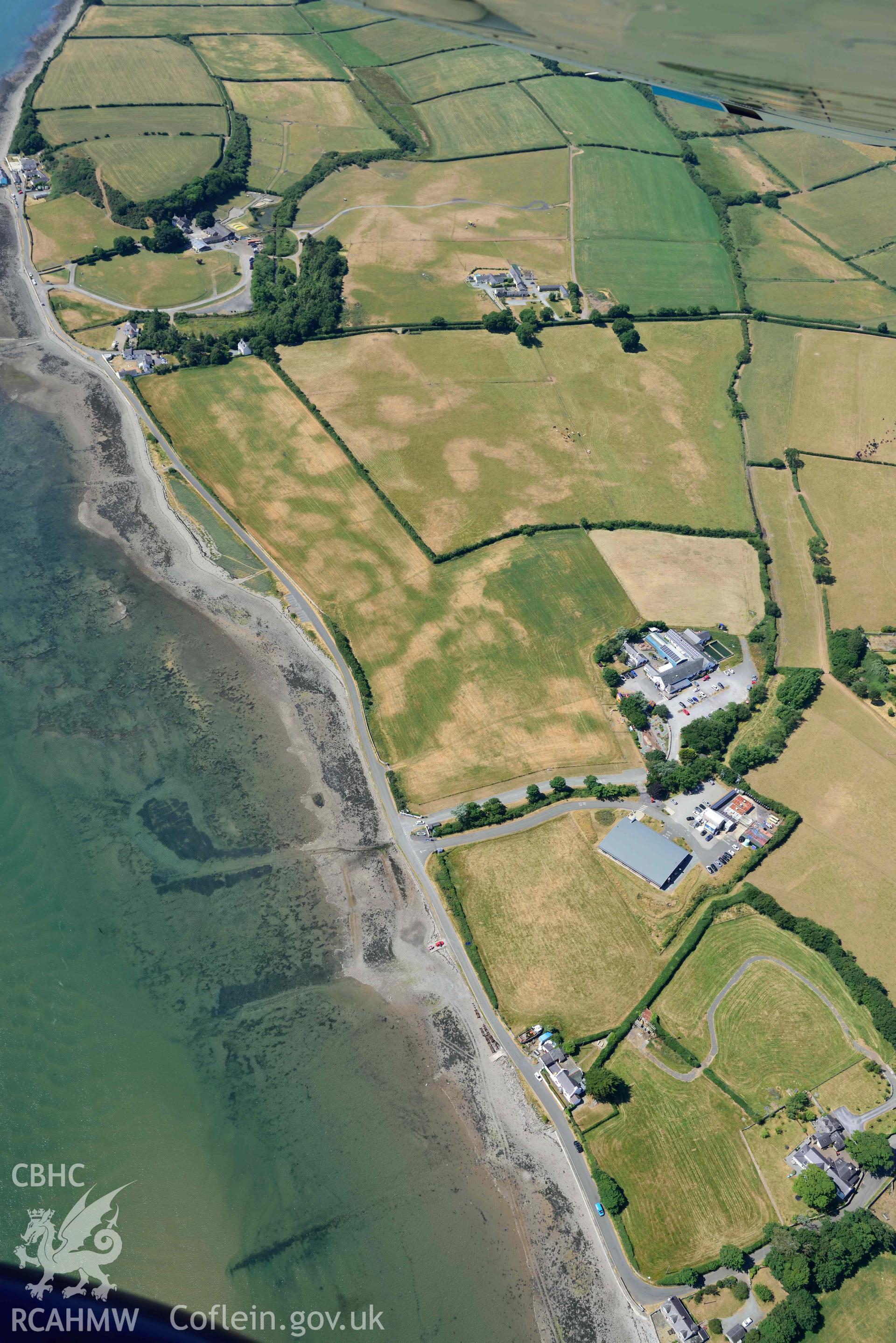 Aerial photograph: Tai Cochion Roman settlement, parchmarks. Crown: CHERISH PROJECT 2018. Produced with EU funds through the Ireland Wales Co-operation Programme 2014-2020 (NGR: SH479656)
