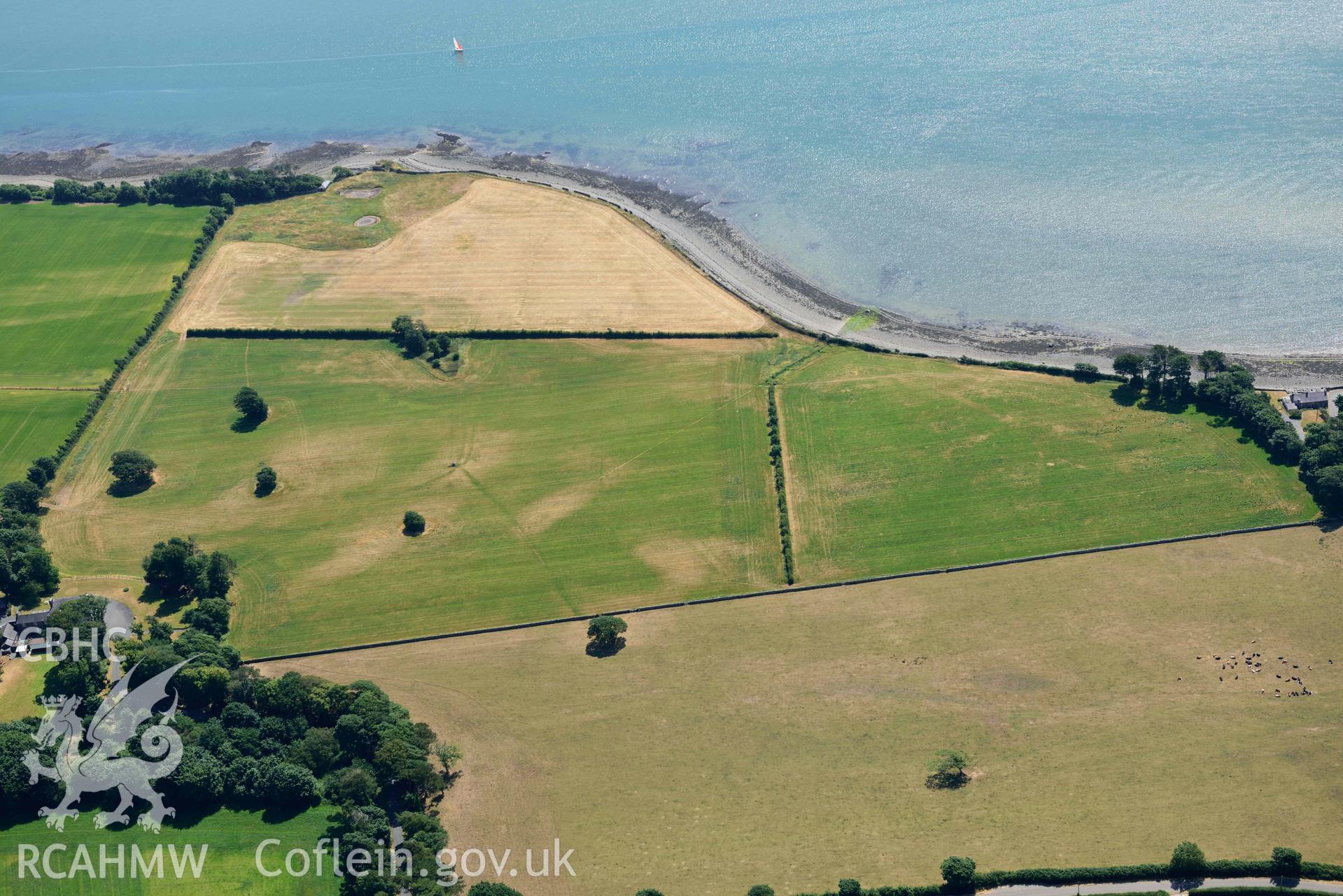 Aerial photograph: Tai Cochion Roman settlement, cropmarks south of Plas Trefarthen. Crown: CHERISH PROJECT 2018. Produced with EU funds through the Ireland Wales Co-operation Programme 2014-2020 (NGR: SH482658)