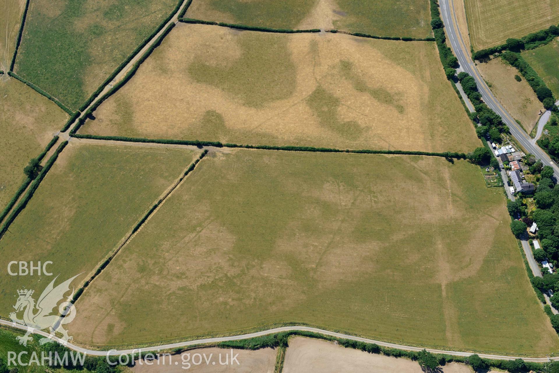 Aerial photograph: Glanllynnau early field system cropmarks, view from east. Crown: CHERISH PROJECT 2018. Produced with EU funds through the Ireland Wales Co-operation Programme 2014-2020 (NGR SH461377)