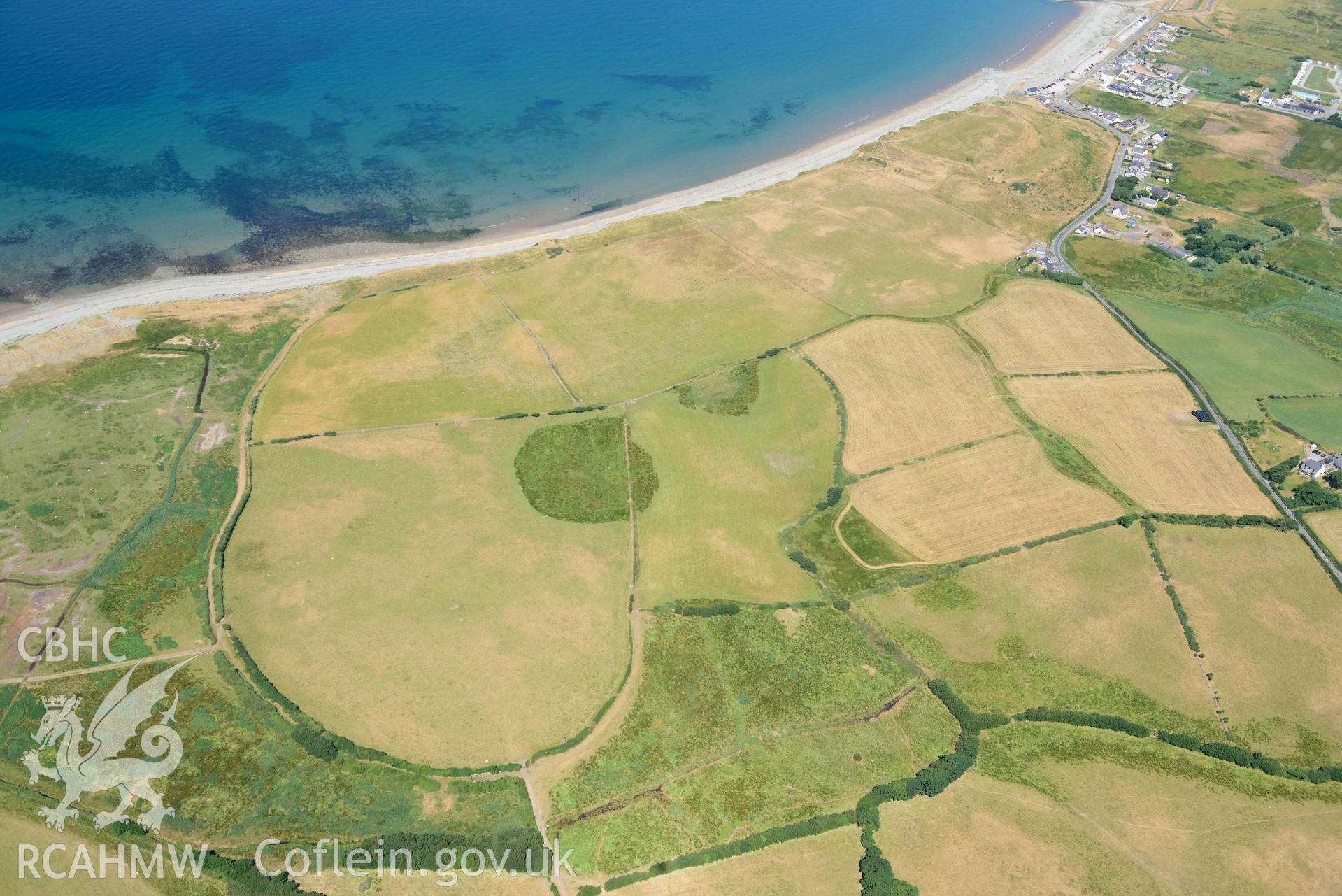 Aerial photograph: Field system south of Dinas Dinlle, view from east. Crown: CHERISH PROJECT 2018. Produced with EU funds through the Ireland Wales Co-operation Programme 2014-2020 (NGR: SH438556)