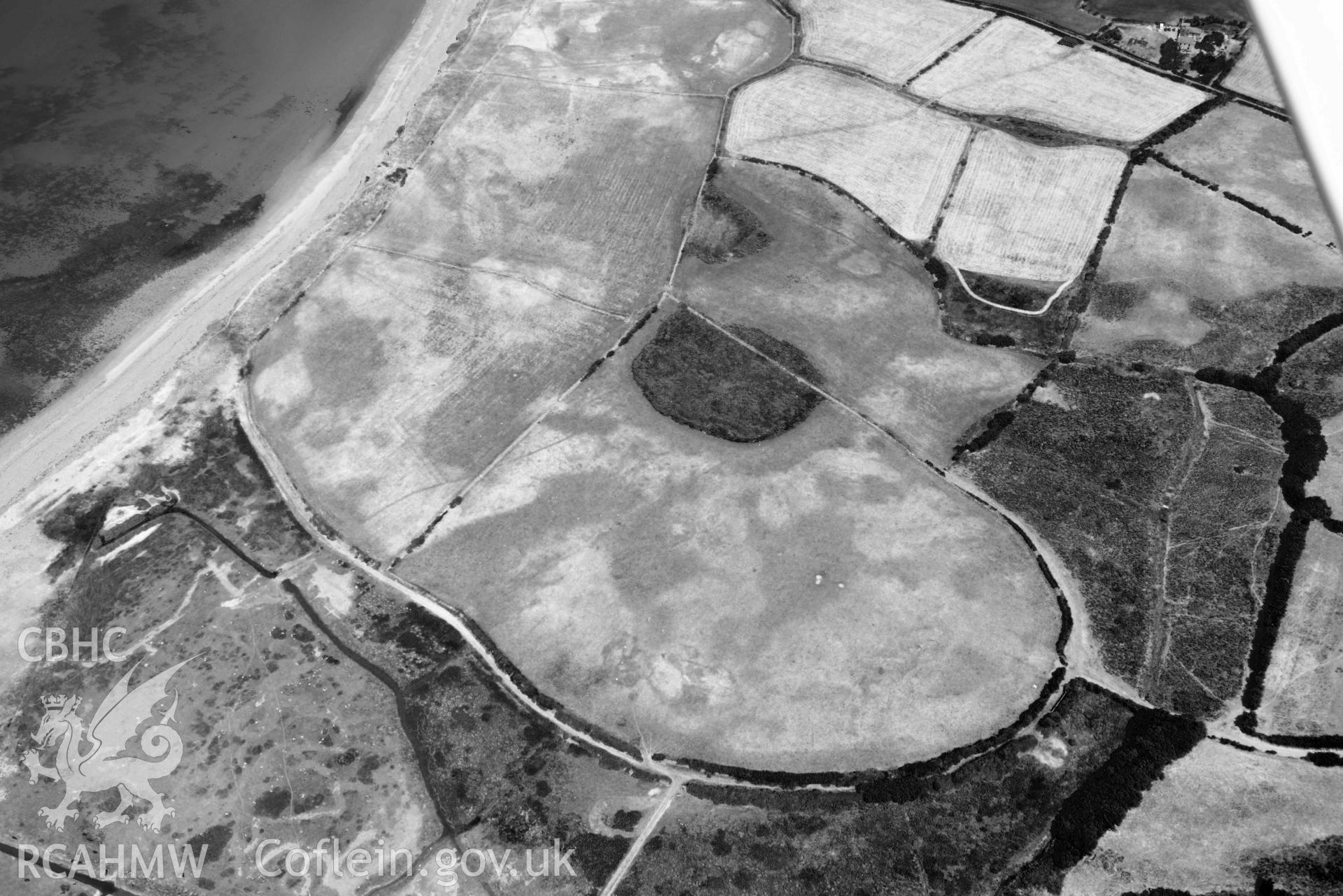 Aerial photograph: Field system south of Dinas Dinlle, view from southeast. Crown: CHERISH PROJECT 2018. Produced with EU funds through the Ireland Wales Co-operation Programme 2014-2020 (NGR: SH438556)