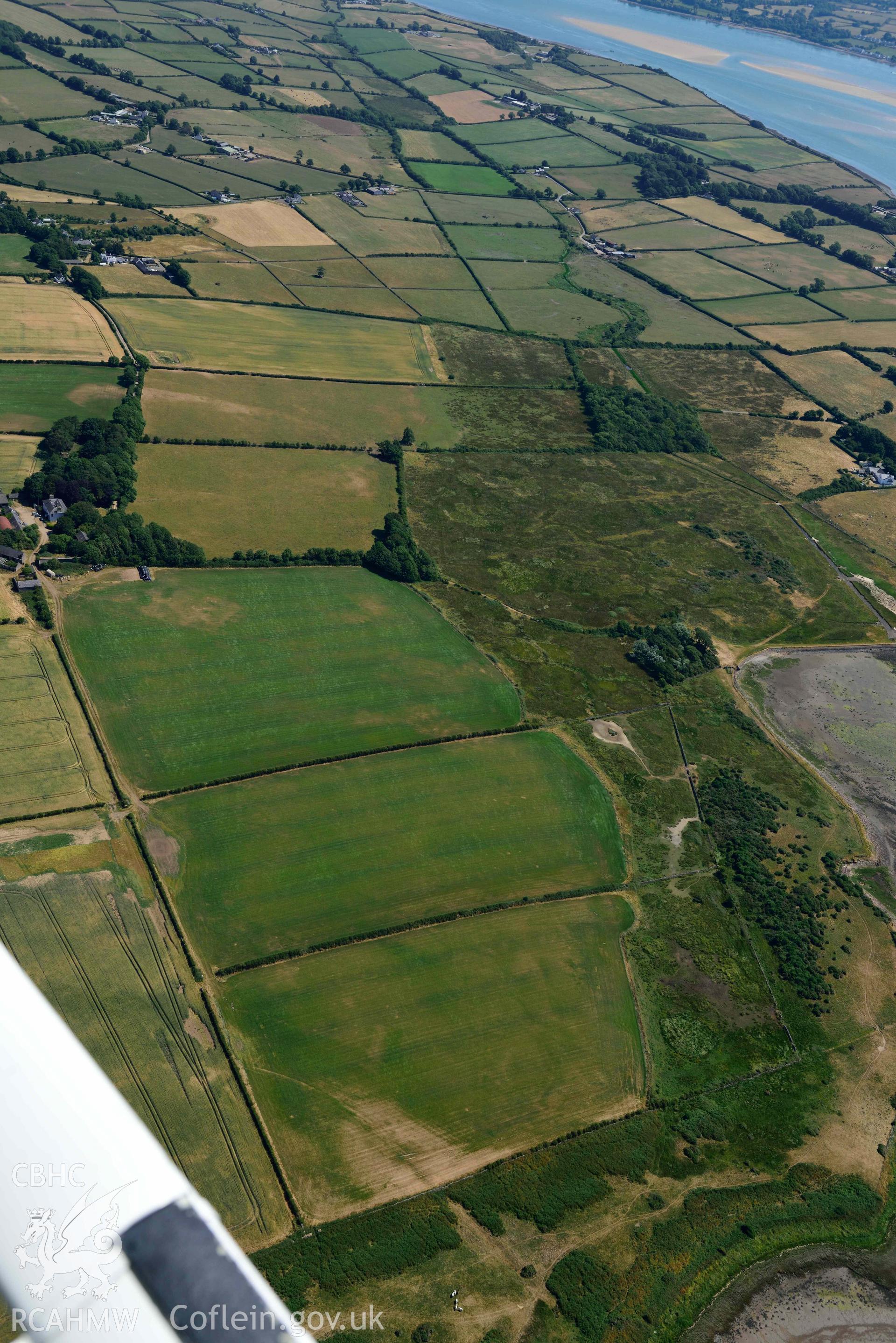 Aerial photograph: Rhuddgaer, findspot of Roman coffin. Crown: CHERISH PROJECT 2018. Produced with EU funds through the Ireland Wales Co-operation Programme 2014-2020 (NGR: SH441638)