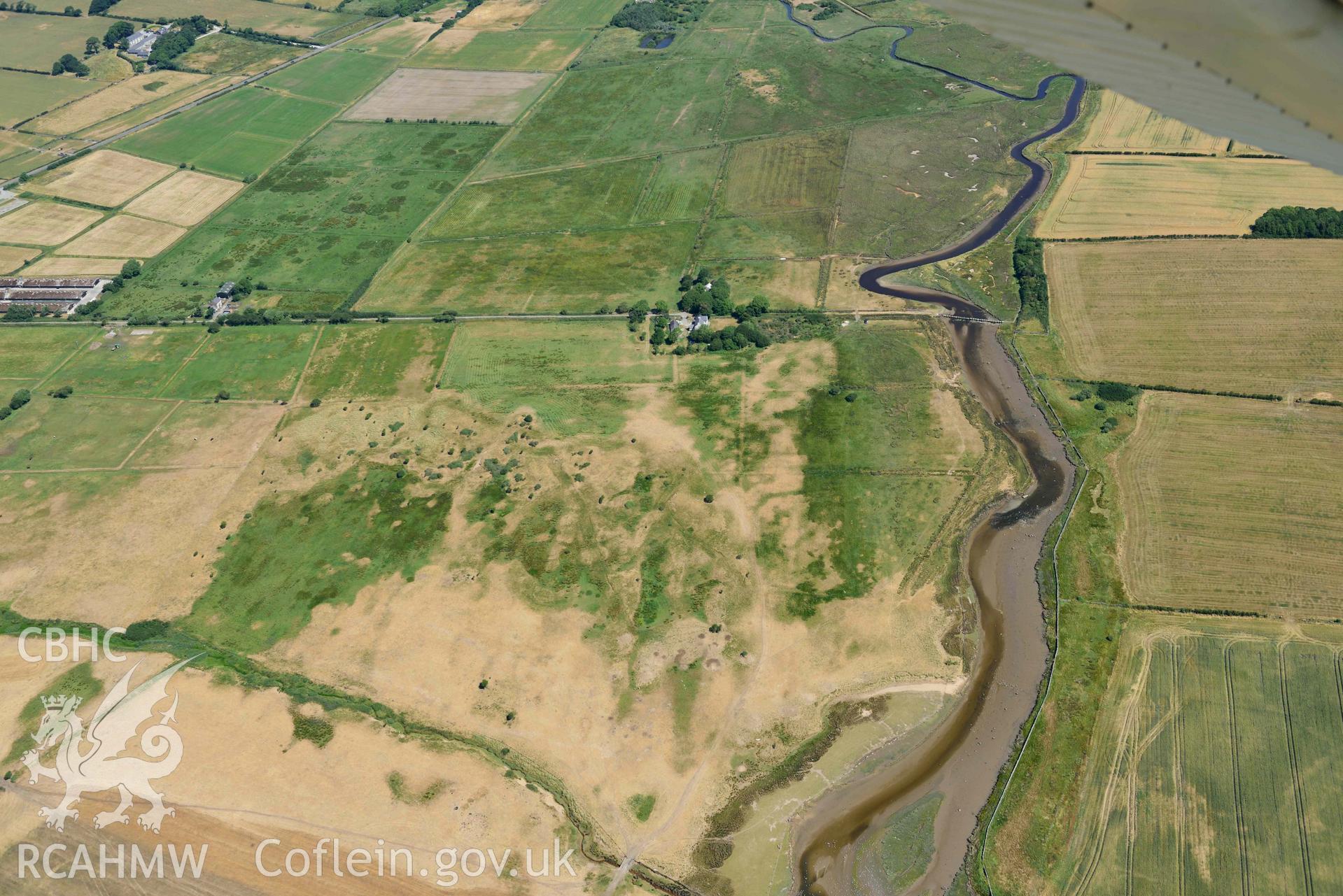 Aerial photograph: Cropmarks at Rhuddgaer. Crown: CHERISH PROJECT 2018. Produced with EU funds through the Ireland Wales Co-operation Programme 2014-2020 (NGR: SH441638)