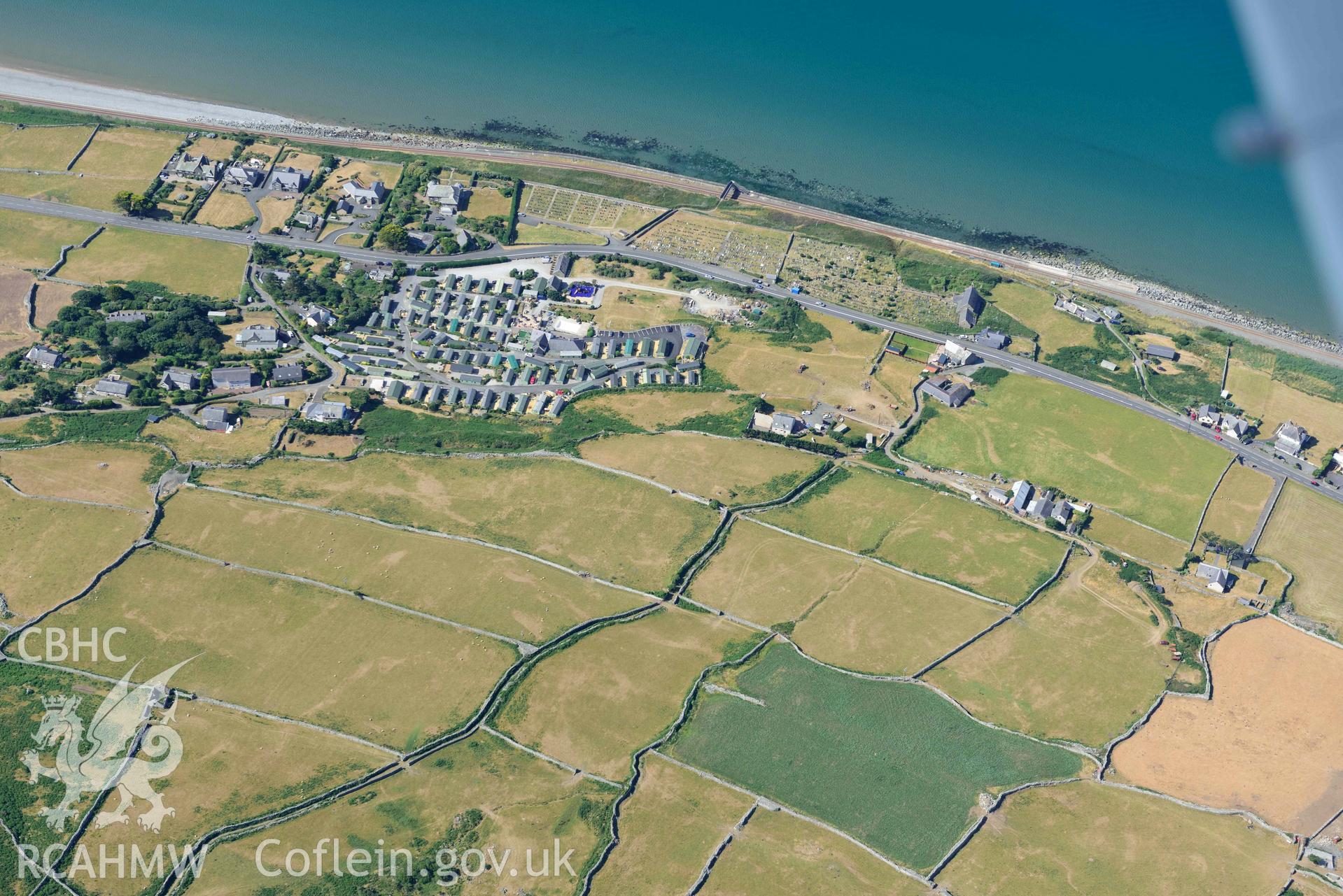 Aerial photograph: St Mary and St Bodfan's, Llanaber, view from east with terraced fields. Crown: CHERISH PROJECT 2018. Produced with EU funds through the Ireland Wales Co-operation Programme 2014-2020 (NGR: SH599180)