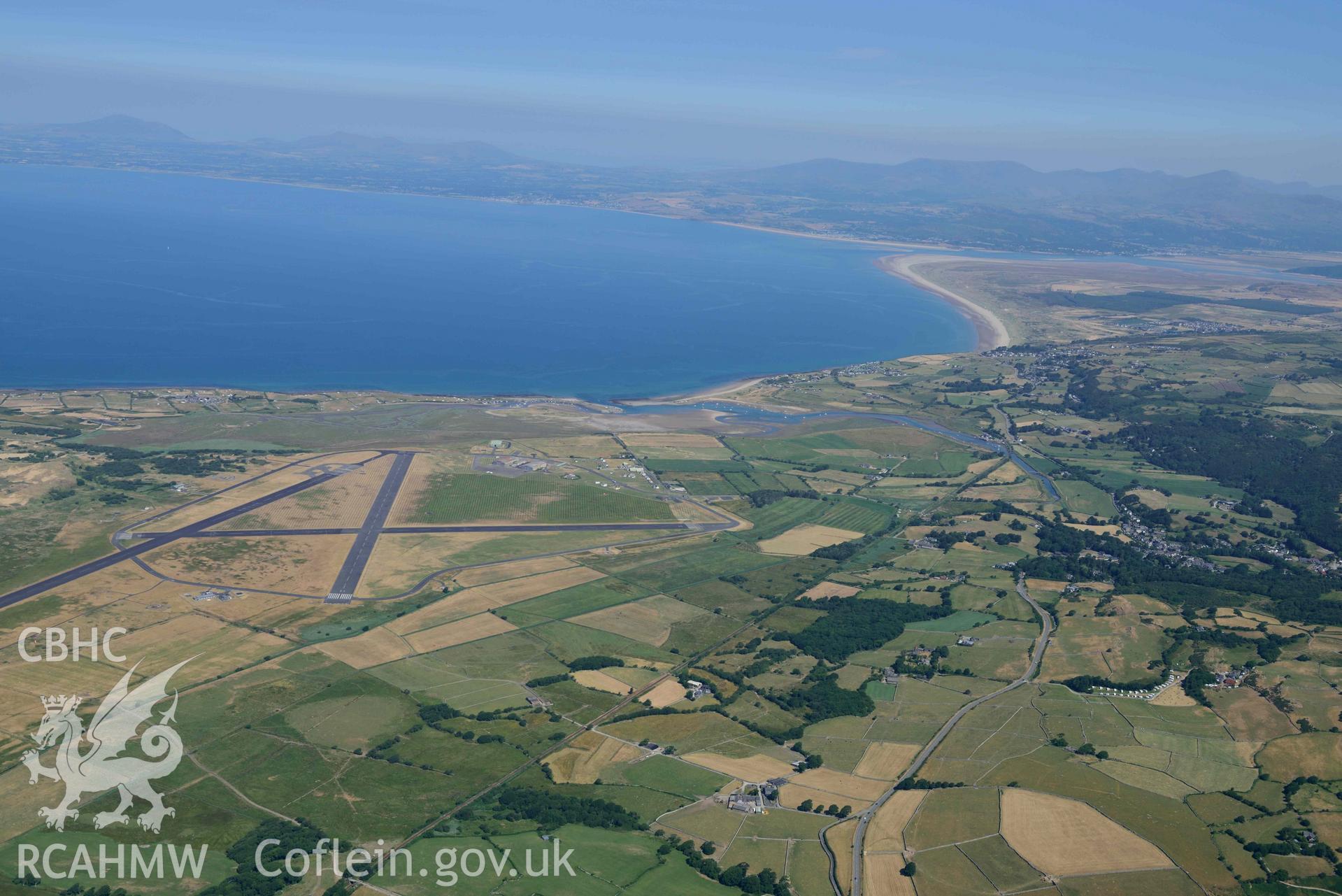 Aerial photograph: Llanbedr Airfield, view from east. Crown: CHERISH PROJECT 2018. Produced with EU funds through the Ireland Wales Co-operation Programme 2014-2020 (NGR: SH570260)