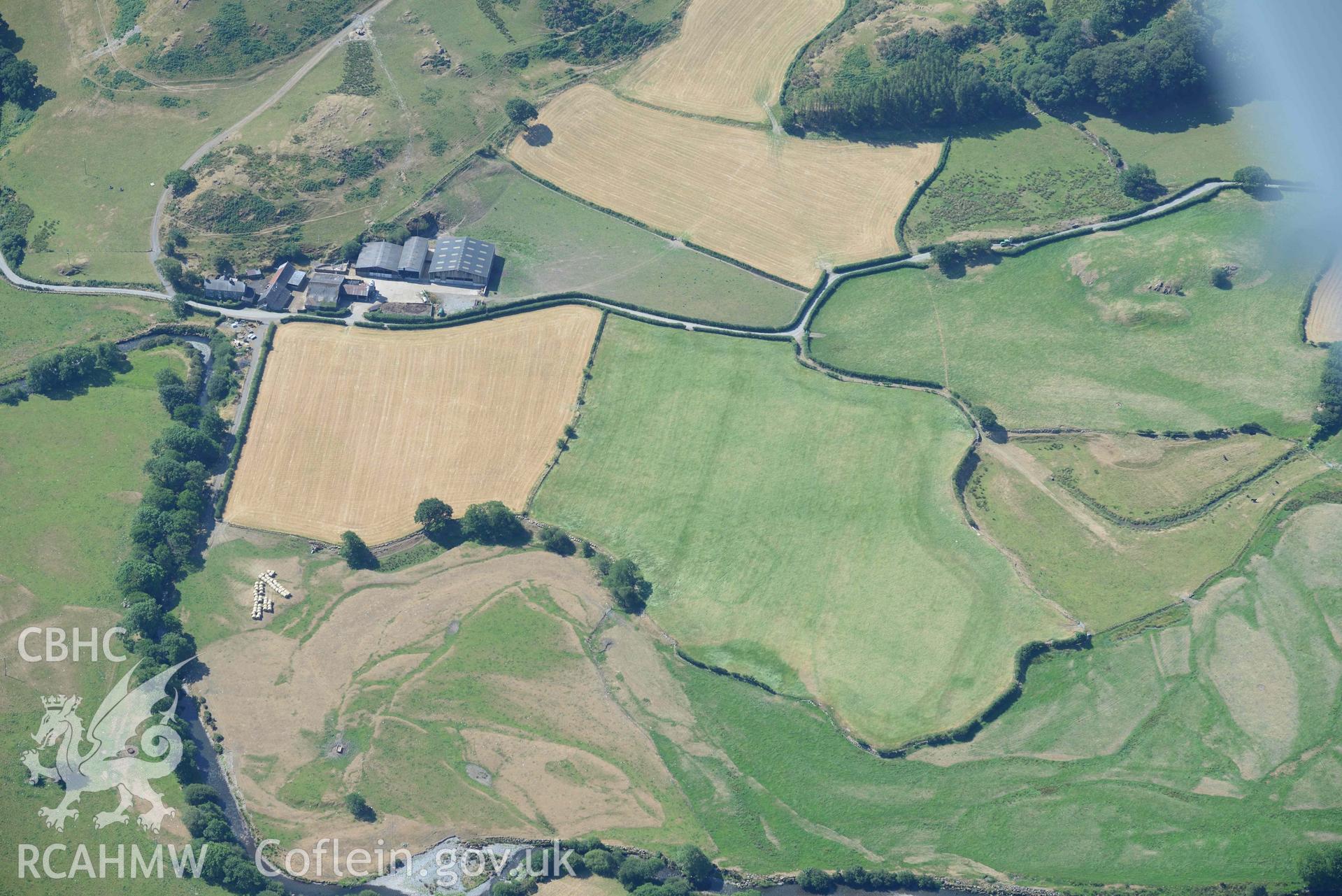 Aerial photograph: Dyffryn Dysynni, Tyn y Bryn cropmark enclosure. Crown: CHERISH PROJECT 2018. Produced with EU funds through the Ireland Wales Co-operation Programme 2014-2020 (NGR: SH657081)