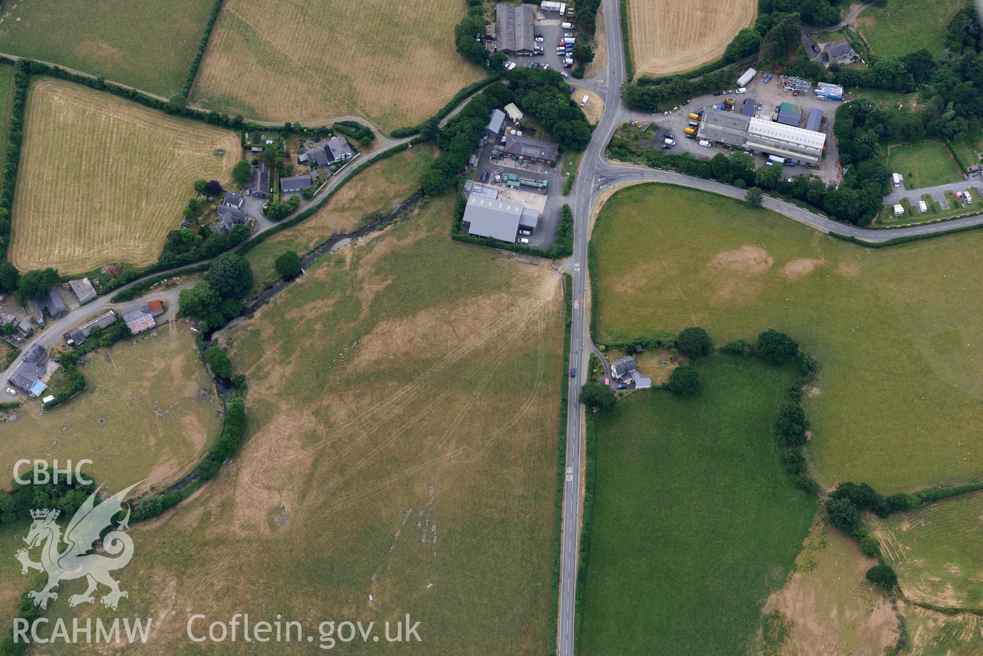 Aerial photograph: Bryncrug, Pont y Felindre cropmark complex. Crown: CHERISH PROJECT 2018. Produced with EU funds through the Ireland Wales Co-operation Programme 2014-2020 (NGR SH616031)