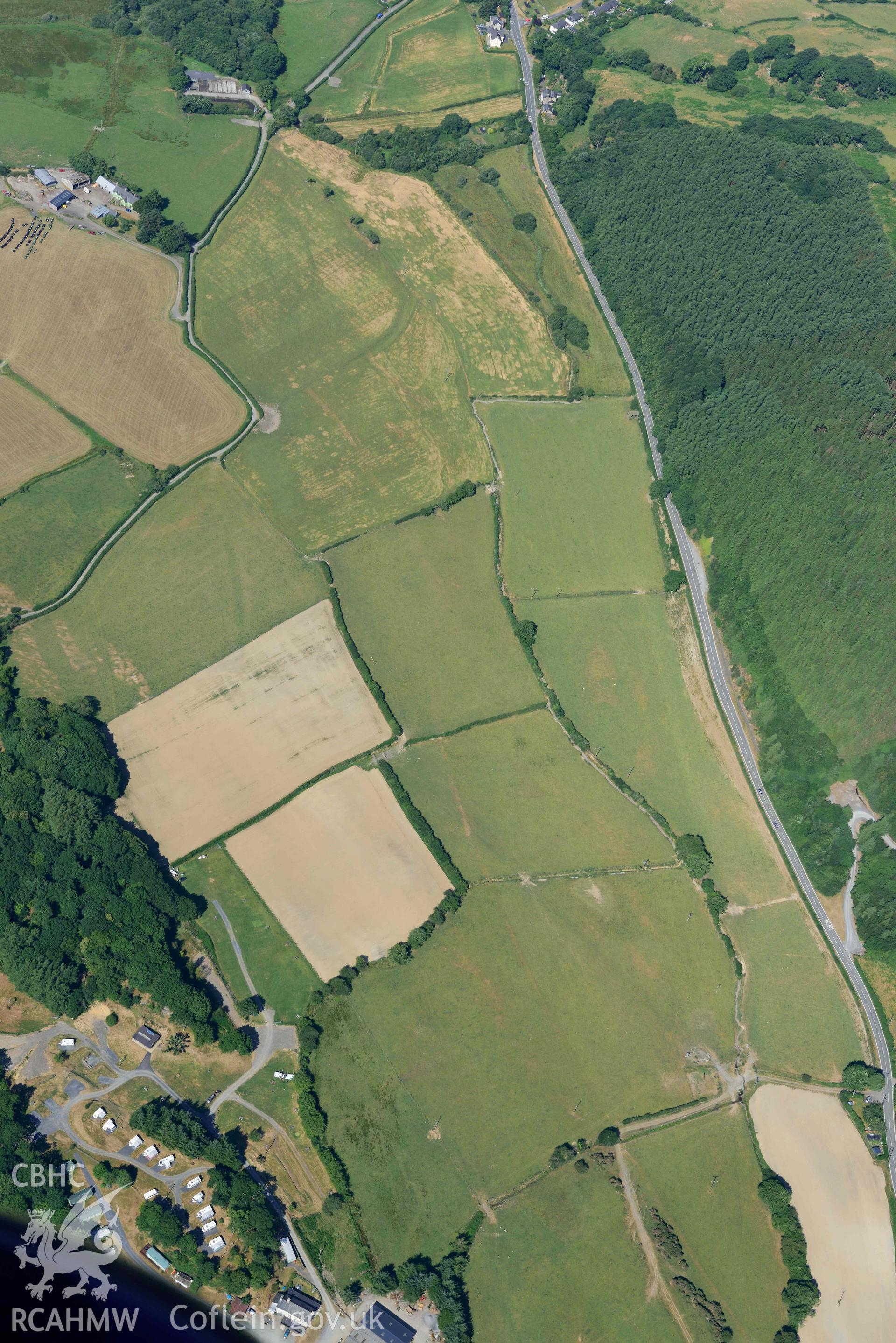 Aerial photograph: Cefn Gaer Roman fort, Pennal. Parchmarks of Roman road approaching from east. Crown: CHERISH PROJECT 2018. Produced with EU funds through the Ireland Wales Co-operation Programme 2014-2020 (NGR: SH704000)