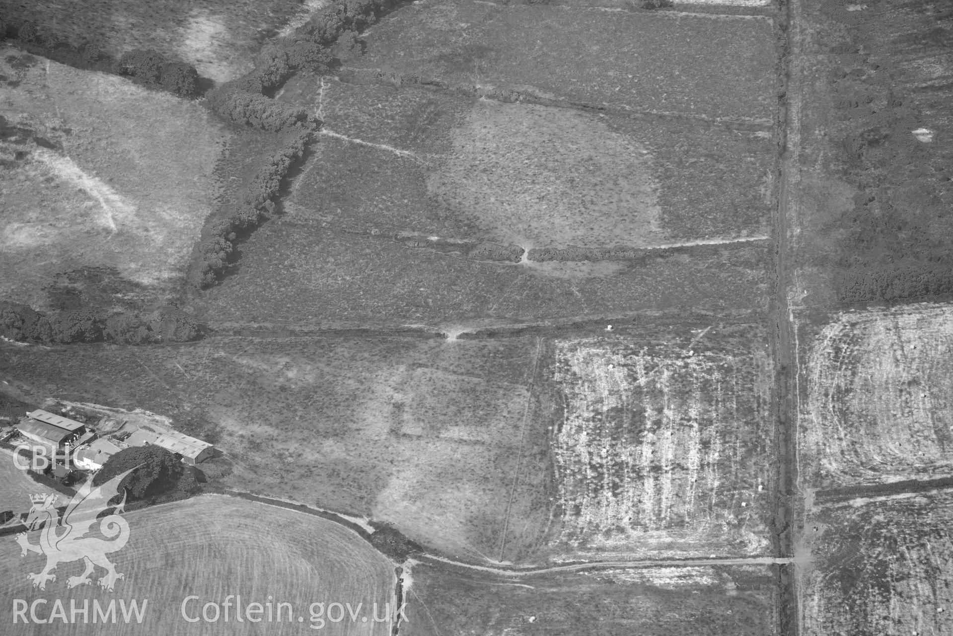 Aerial photograph: Ynyscapel defended enclosure cropmark. Crown: CHERISH PROJECT 2018. Produced with EU funds through the Ireland Wales Co-operation Programme 2014-2020 (NGR: SN643905)