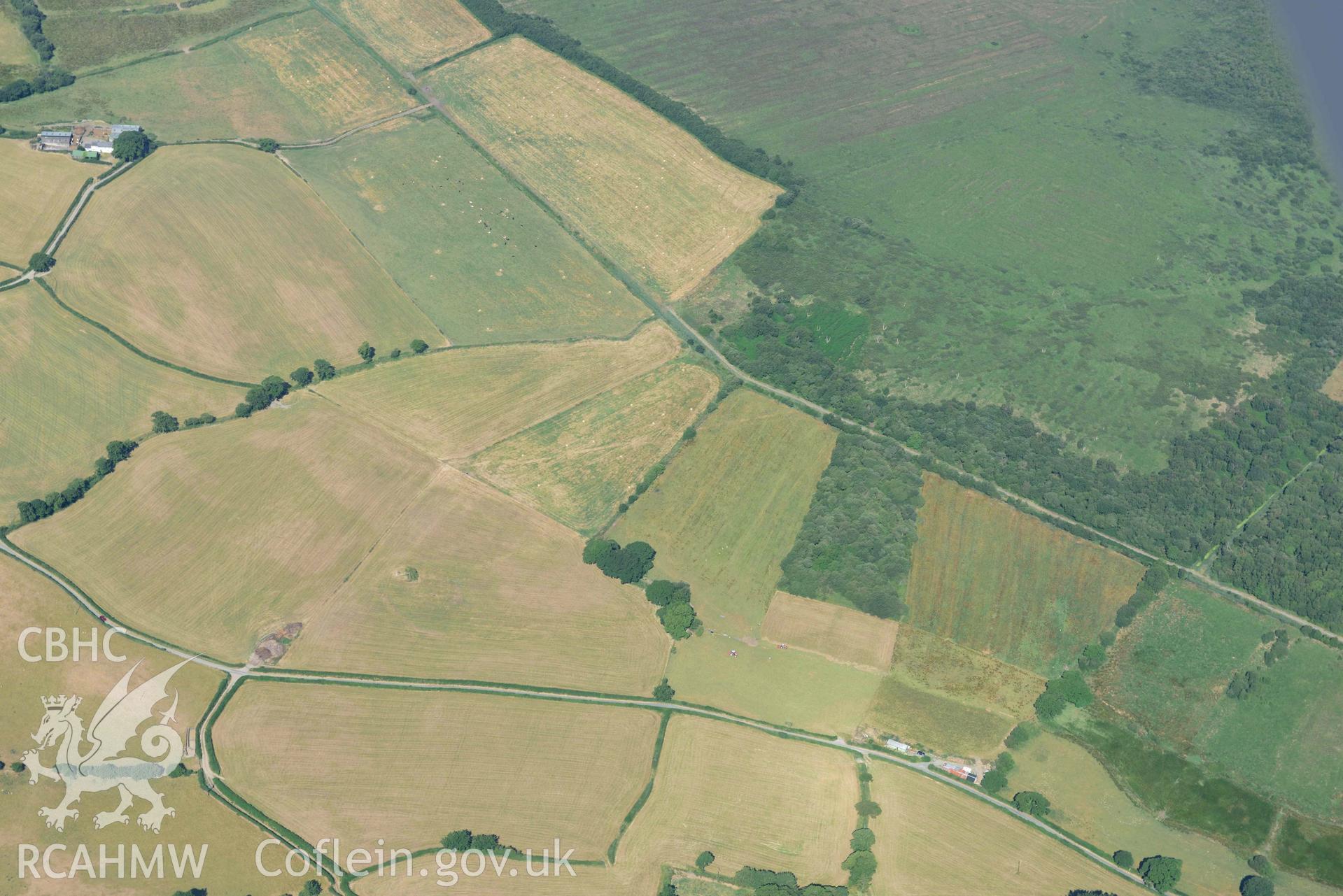 Aerial photograph: Llangynfelin timber trackway, parchmarks from east. Crown: CHERISH PROJECT 2018. Produced with EU funds through the Ireland Wales Co-operation Programme 2014-2020 (NGR: SN648906)