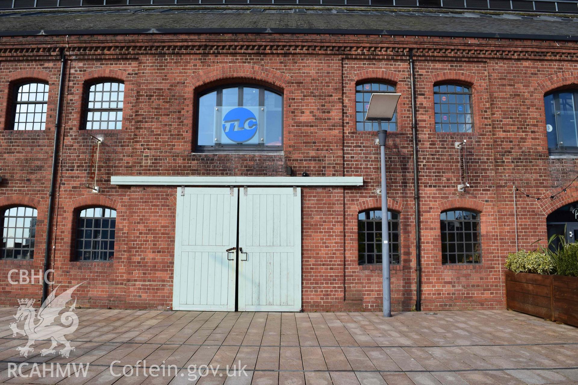 Photograph from an assessment of heritage impact on the setting of the J Shed Listed Building of seating at the Rasoi Waterfront restaurant, Waterfront, Swansea, carried out by Trysor in 2021. Trysor Project No. 2021/783.