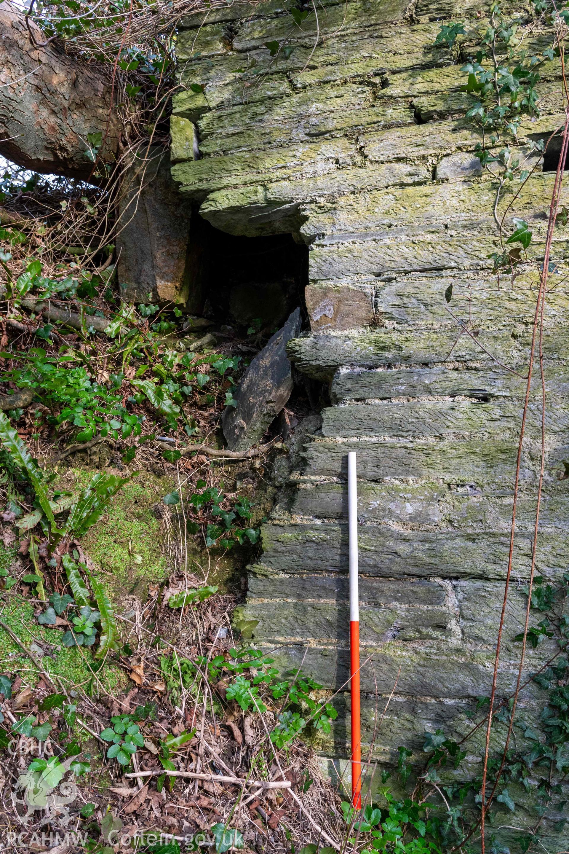 Lime Kiln, Old Castle Farm. Collapse and erosion at north end of west face (with scale).