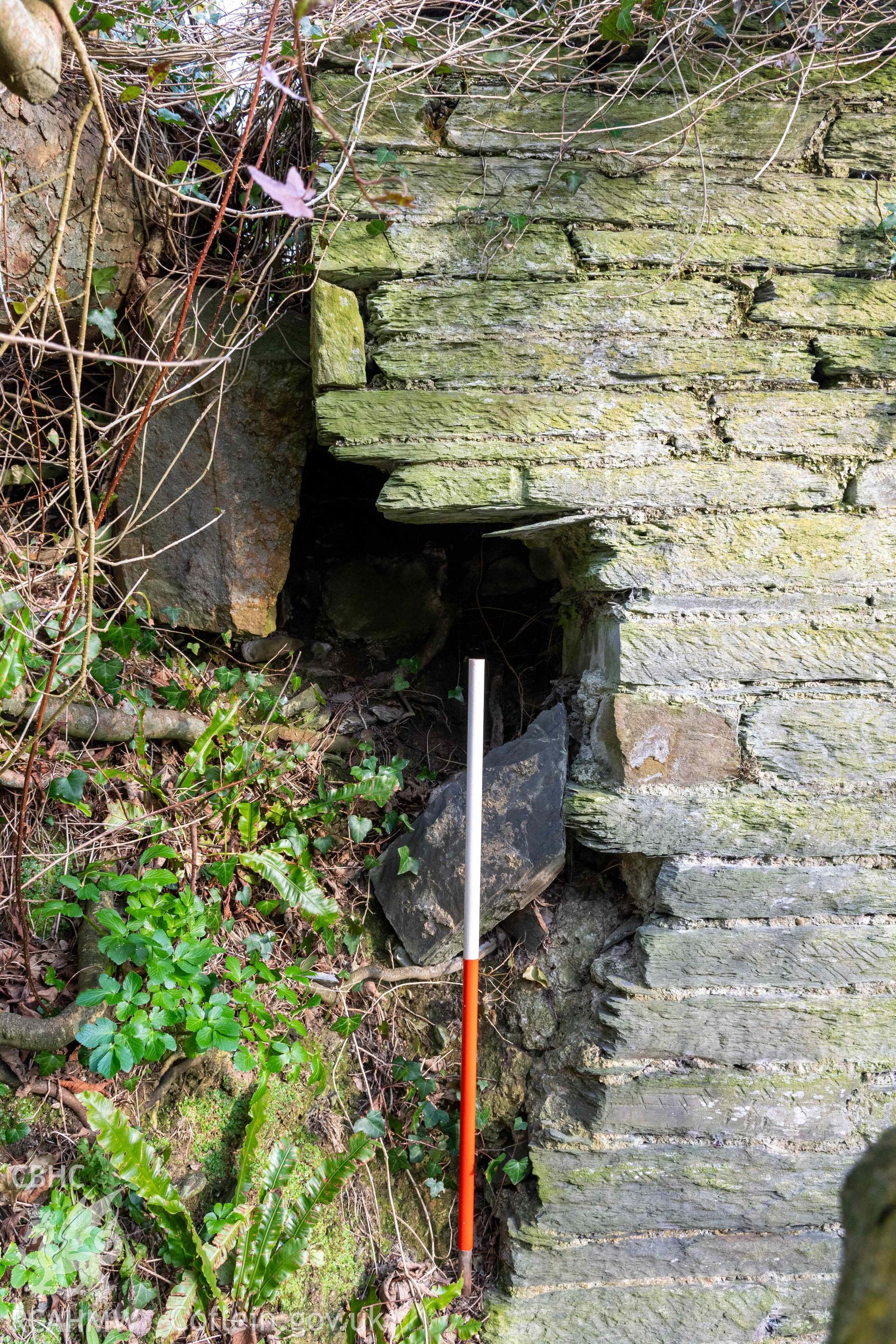 Lime Kiln, Old Castle Farm. Collapse and erosion at north end of west face (with scale).