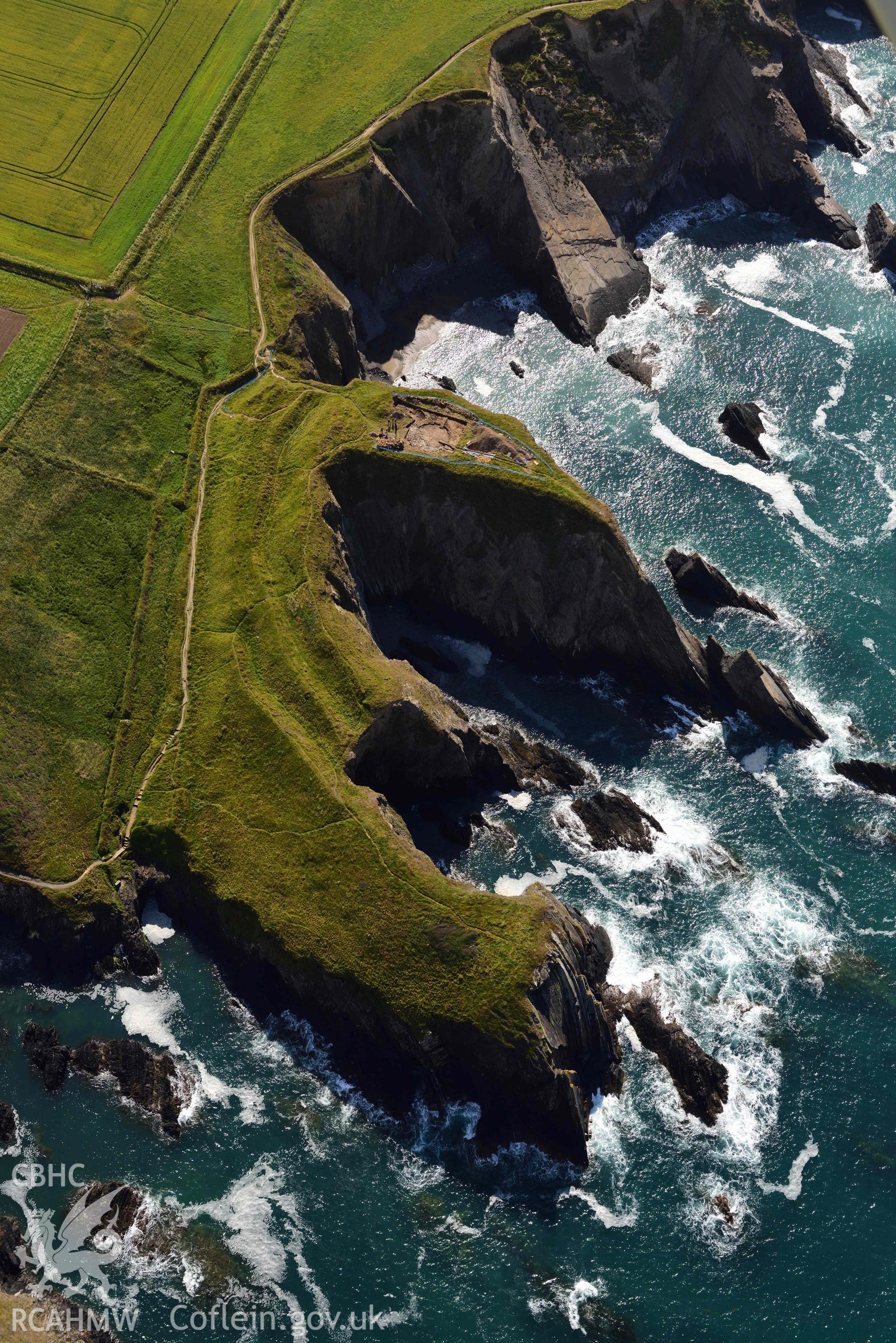 Porth y Rhaw coastal promontory fort. Excavations in progress by the Dyfed Archaeological Trust, June 2022. © Crown: CHERISH PROJECT 2017. Produced with EU funds through the Ireland Wales Co-operation Programme 2014-2023.