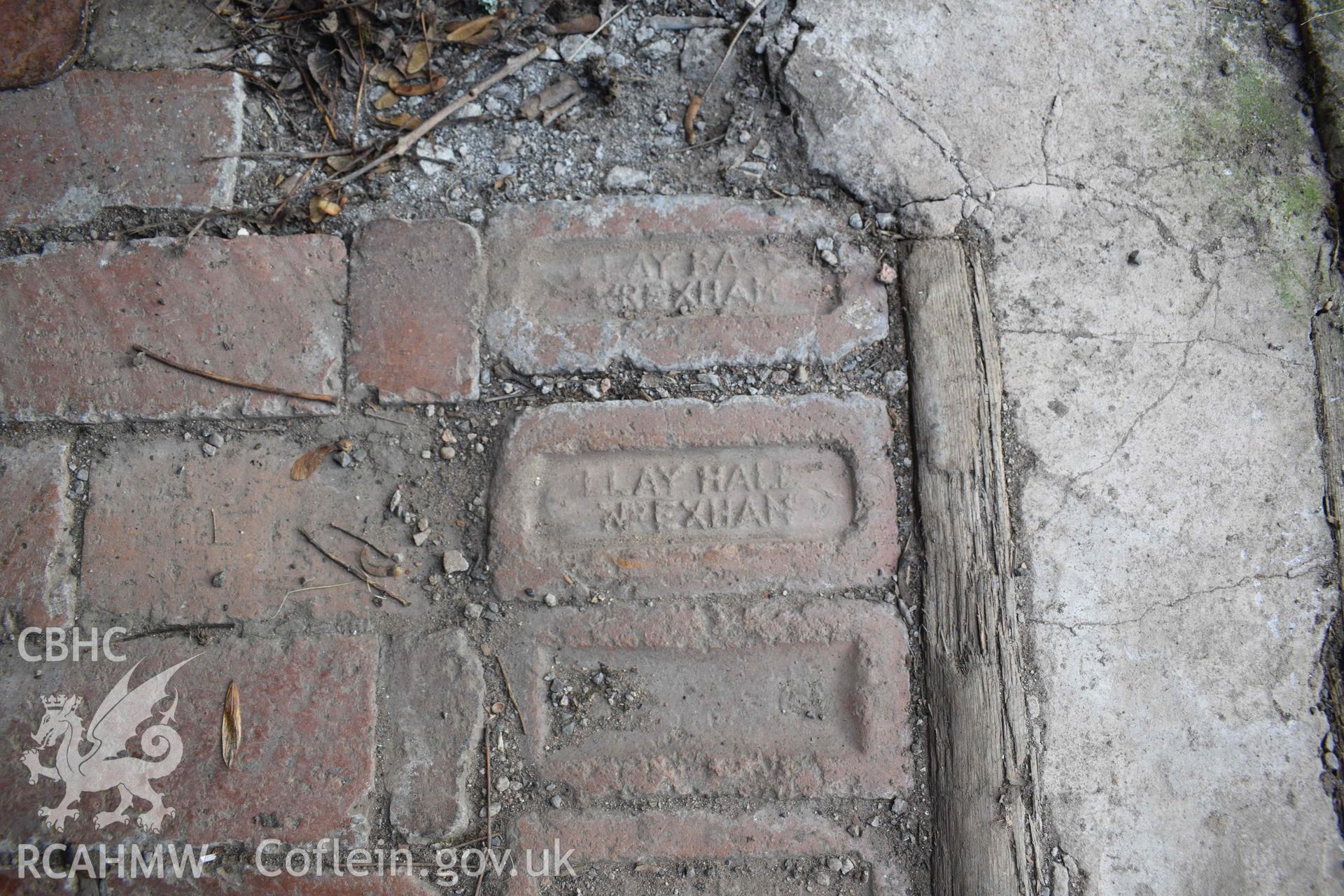 Photograph showing Llay Hall bricks, from a Historic Building Recording of Trevor Basin Corrugated Shed, carried out by Clwyd-Powys Archaeological Trust in 2022. Project no. 2678.